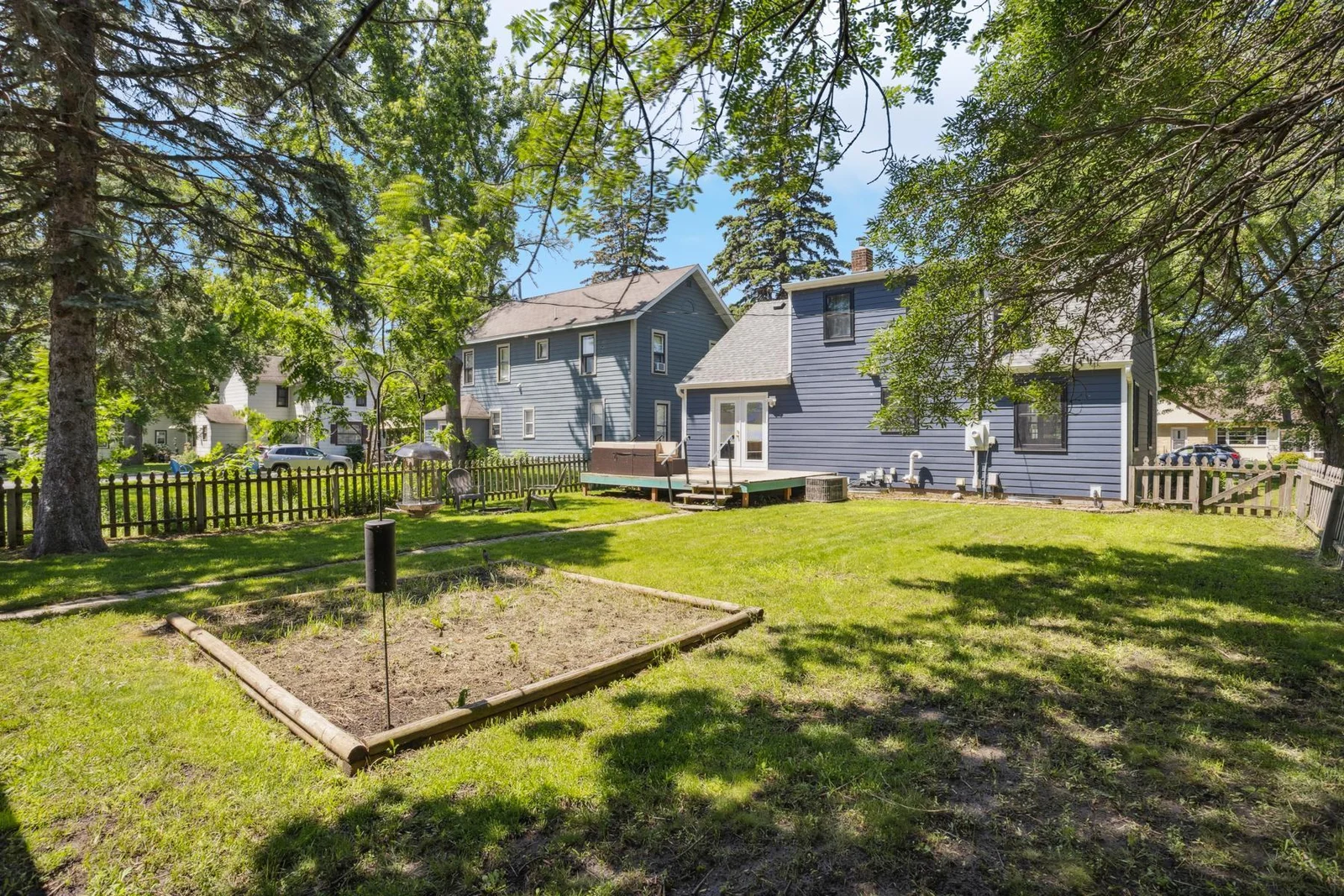 Back of the house with garden and deck