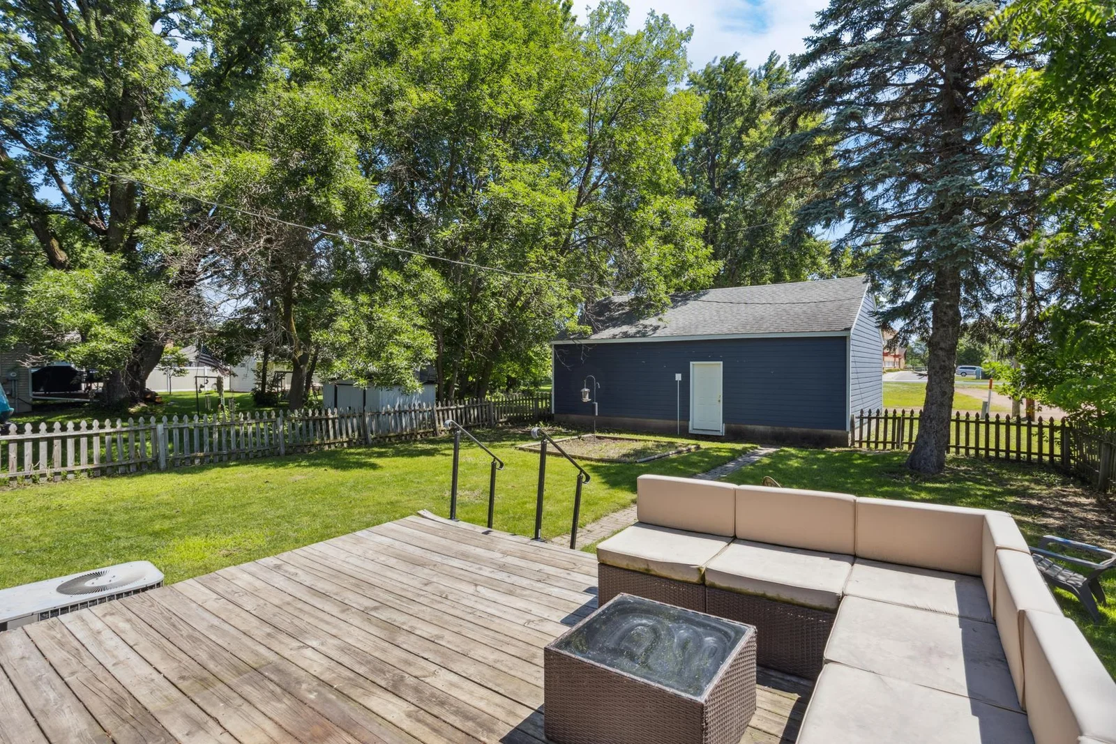 View of the deck and garage