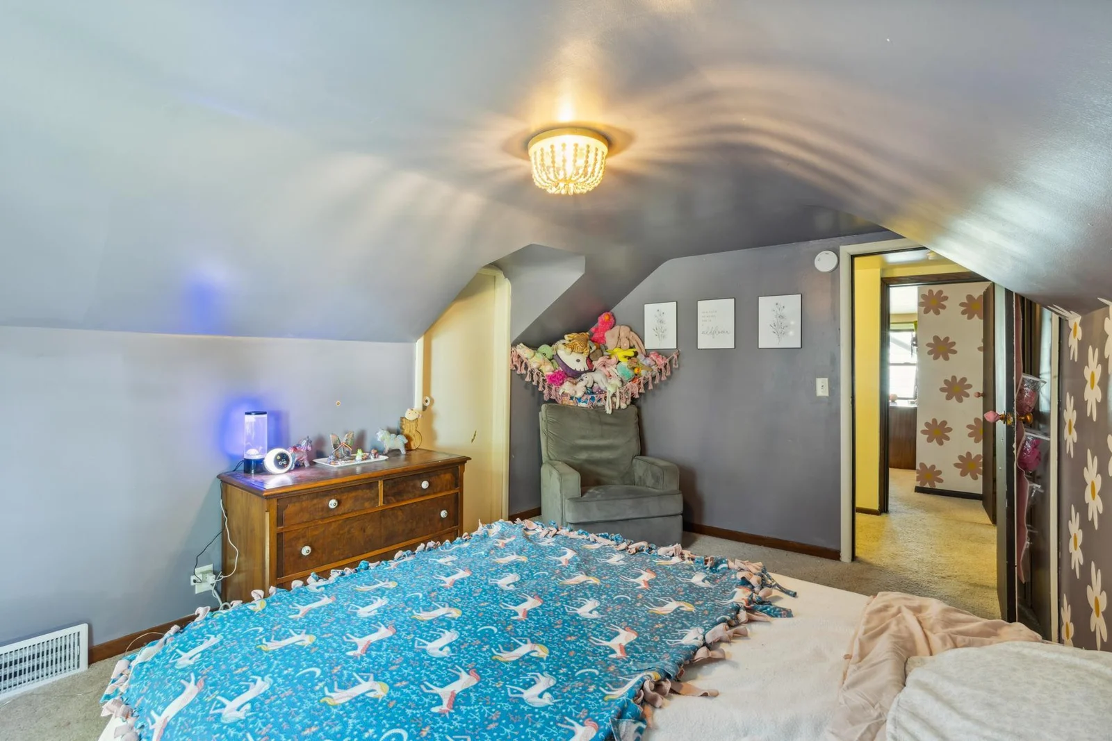 Upper level bedroom with attic access