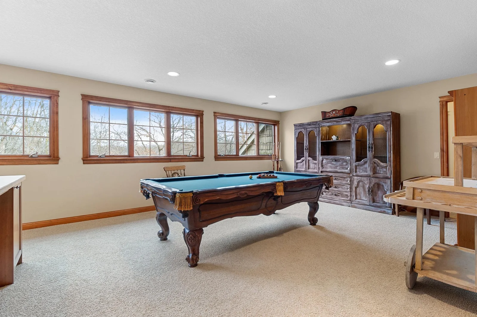 Upper-level billiard /craft room. Large 25' x 15' space. With French doors to upper hallway and access to upper-level full bath. Wired LAN available.