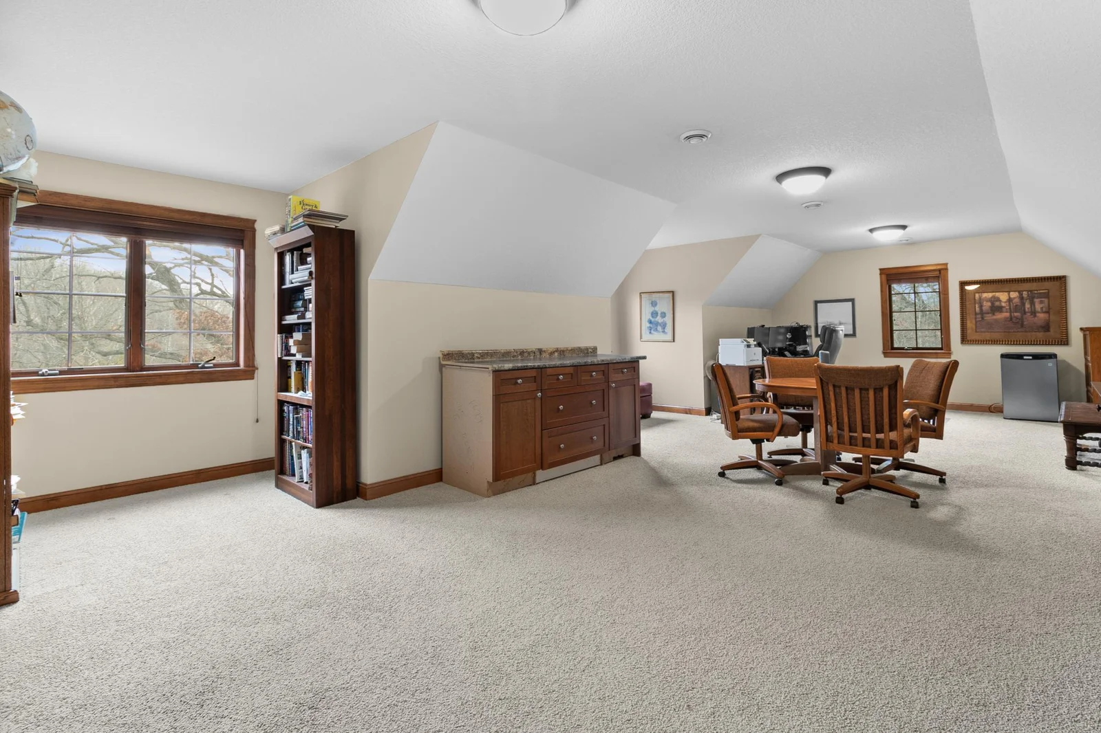 Upper-level bonus room or private office. Large 30' x 18' area is above attached garage and access from back stairway from main level hallway. Be sure not to miss this during showing. Wired LAN available.