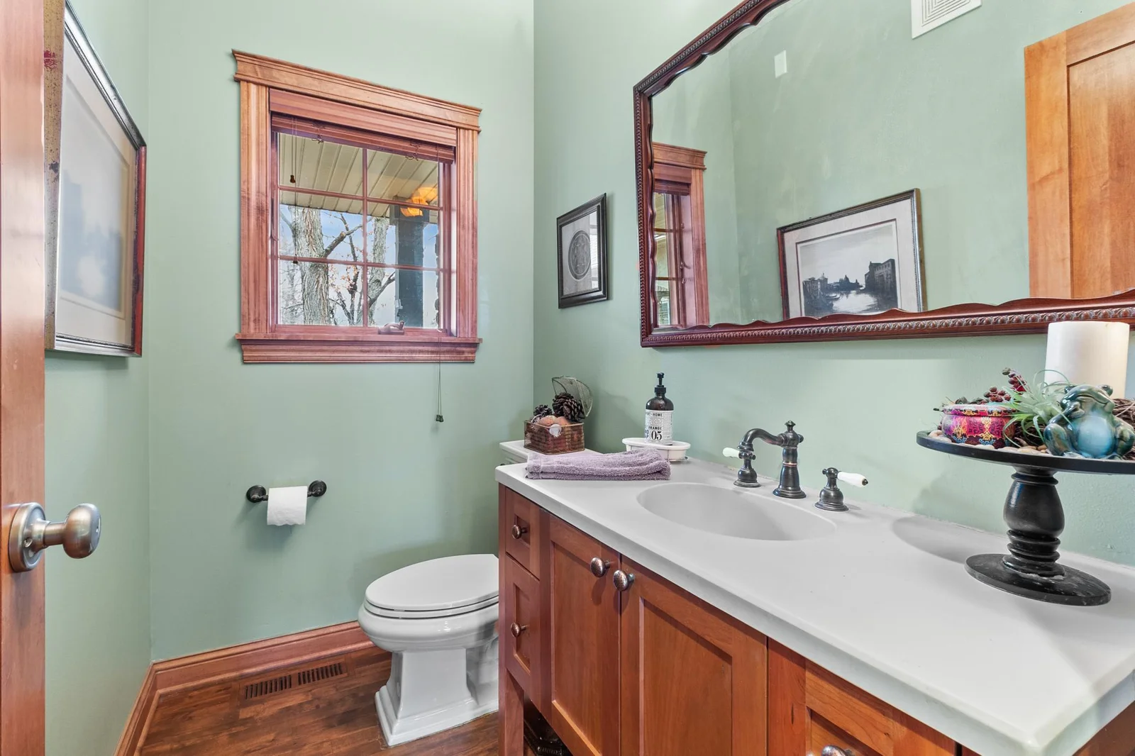 Half bath off main hallway across from kitchen