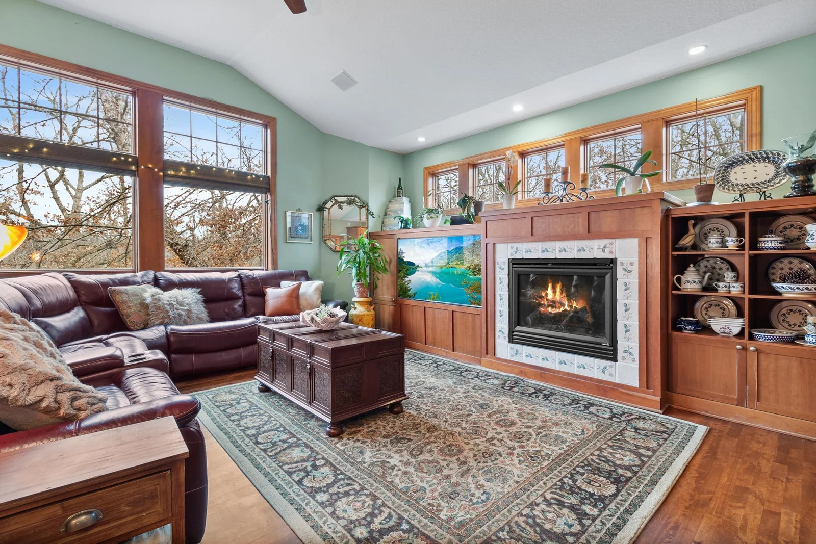 Family room open from kitchen and breakfast area for great entertainment flow. Built-in cherry cabinets with fireplace and media cabinets. Ceiling speakers for connection to media cabinet and whole house audio, wired LAN available