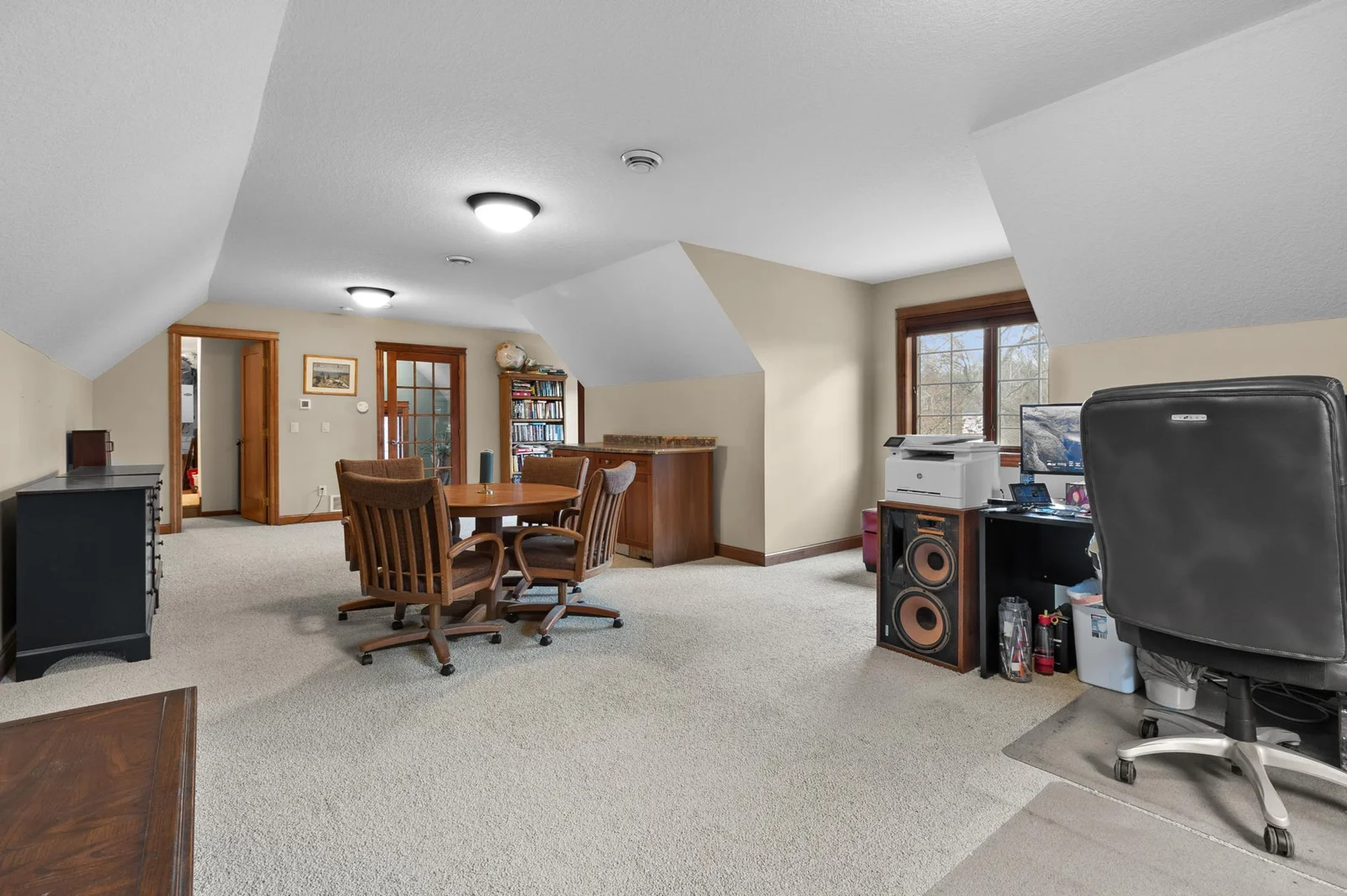 Upper-level bonus room or private office. Viewed looking toward stairway landing. Access to upper-level storage and mechanical room. Wire LAN available.