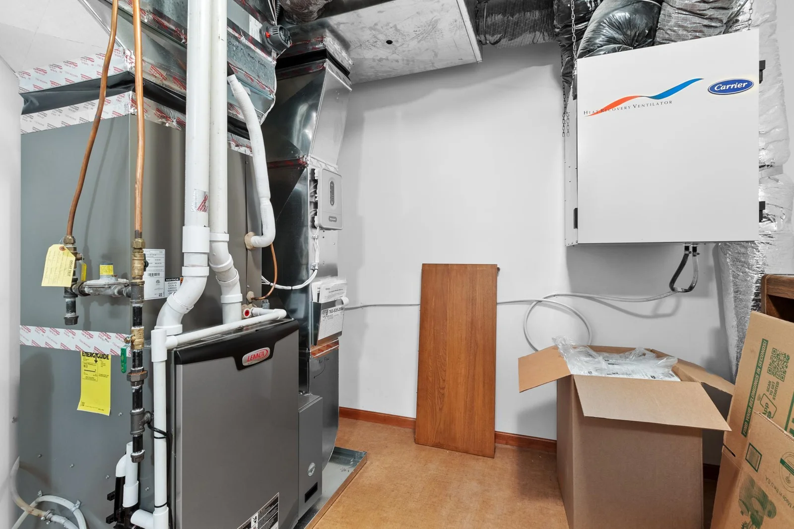 Upper-level mechanical room has recent Lenox HVAC with separate zones for upper-level bedrooms and bonus room / private office.