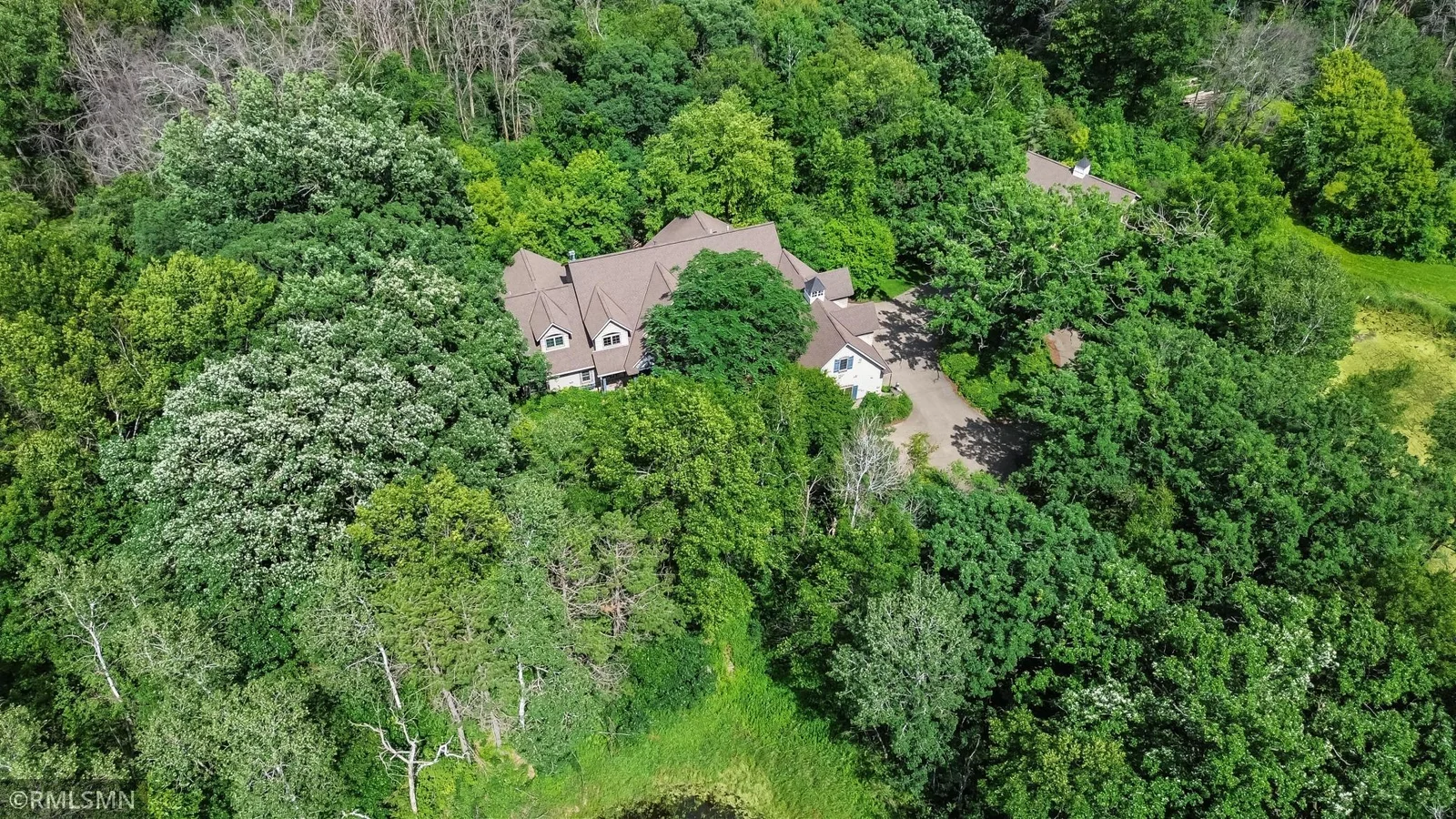 Ariel view of front taken from over pond.