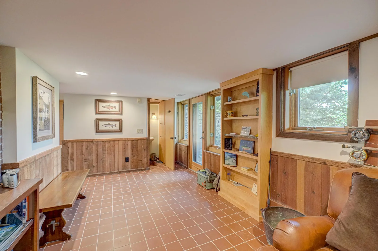 In the hallway to the left are built-in storage cabinets and a double closet.
