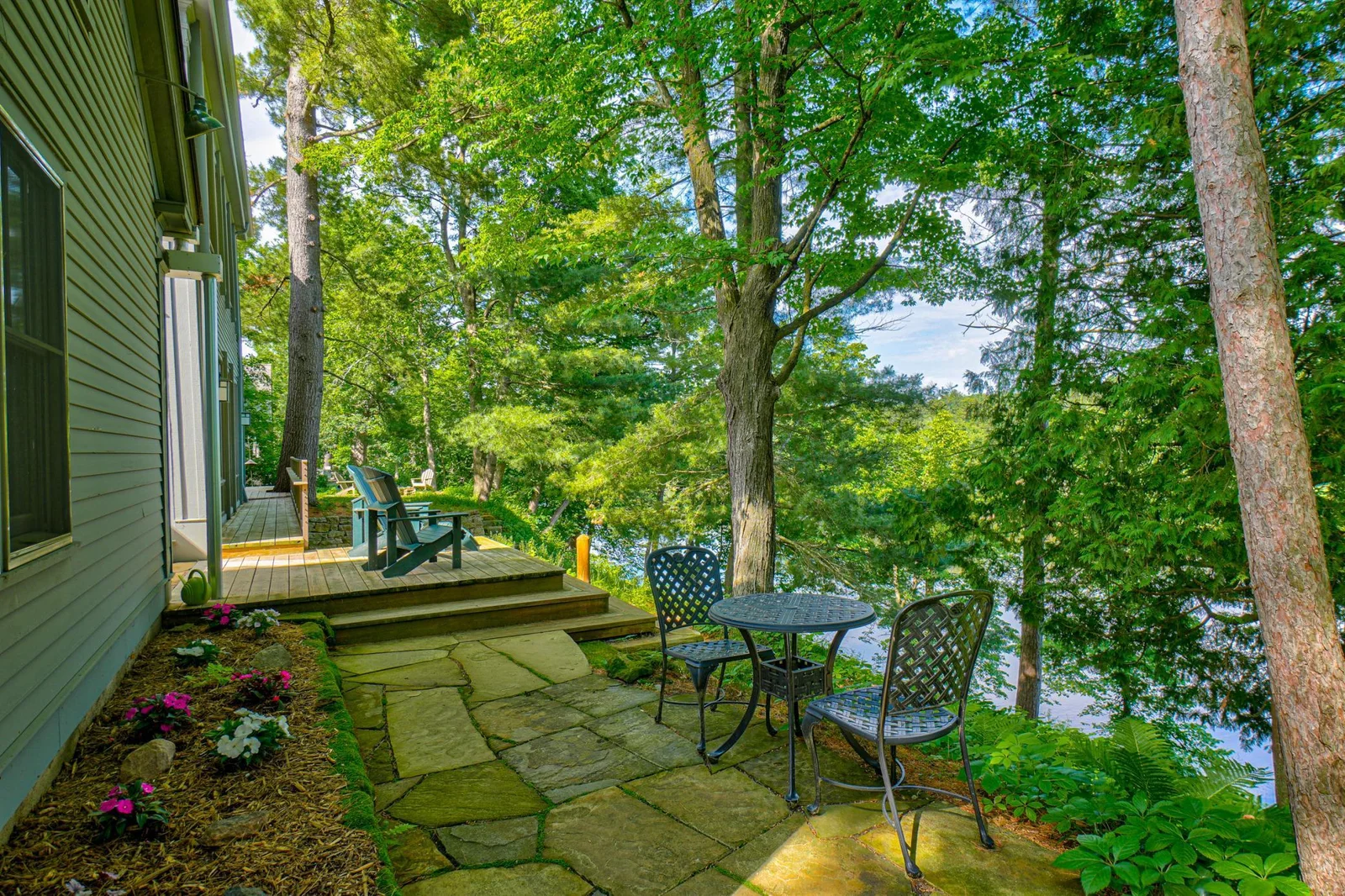 The south porch patio wraps around the corner to the south deck.