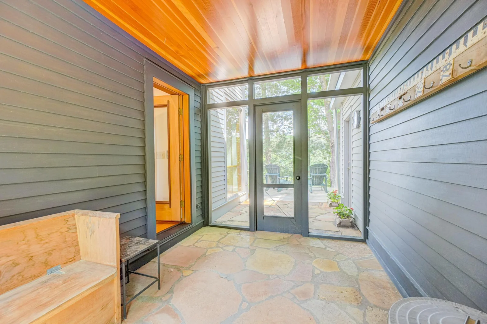 The south porch between the home and garage.