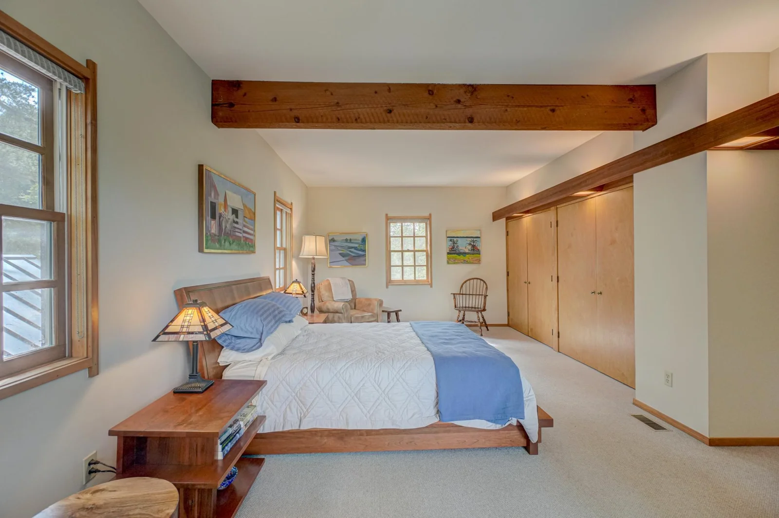 The clear maple closet doors were custom made.  The cherrywood soffits bring that soft warm light seen throughout the home.