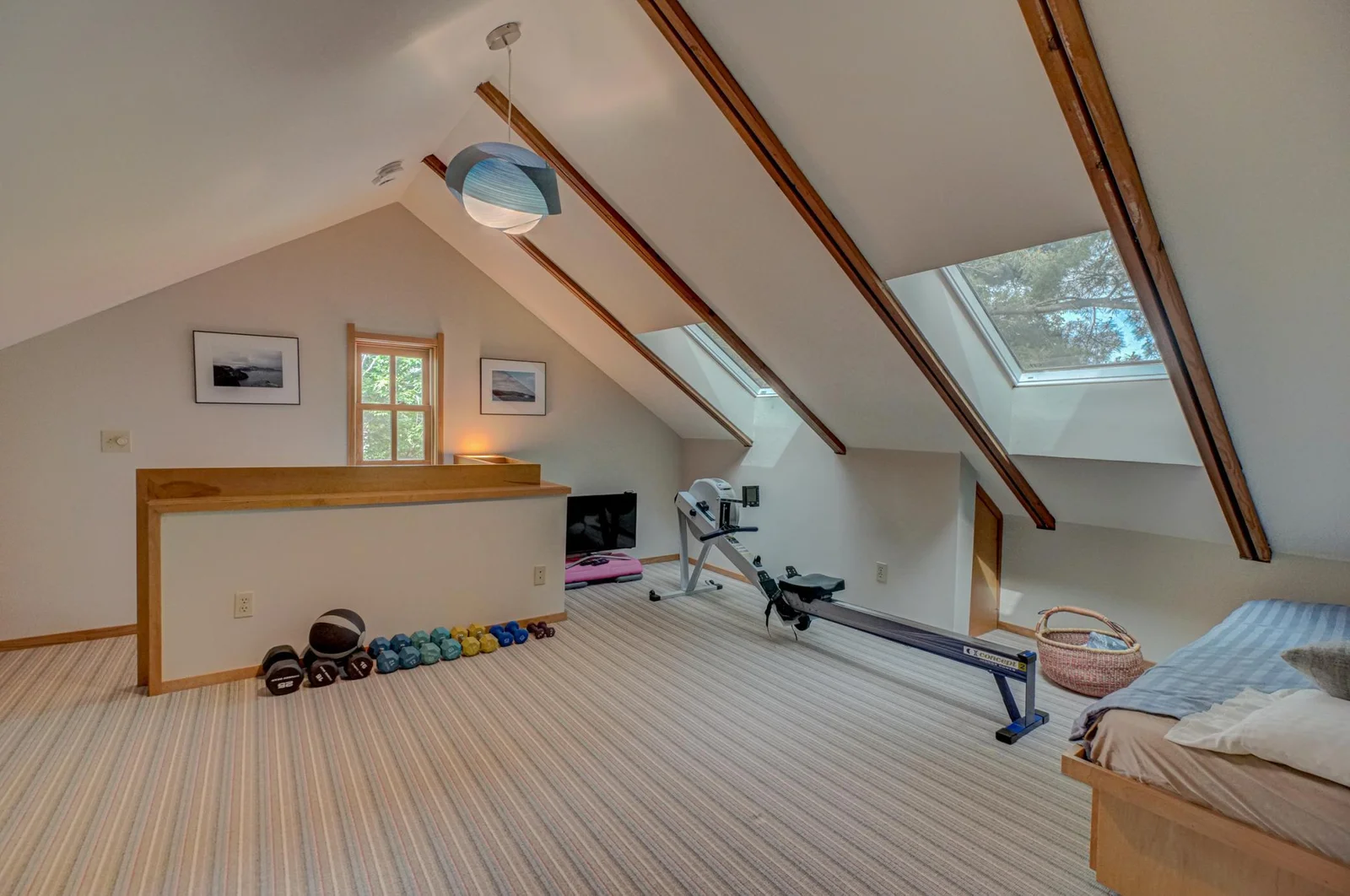 The fixed skylight tinted windows were installed in 2022. This room could also be a quiet getaway office space.