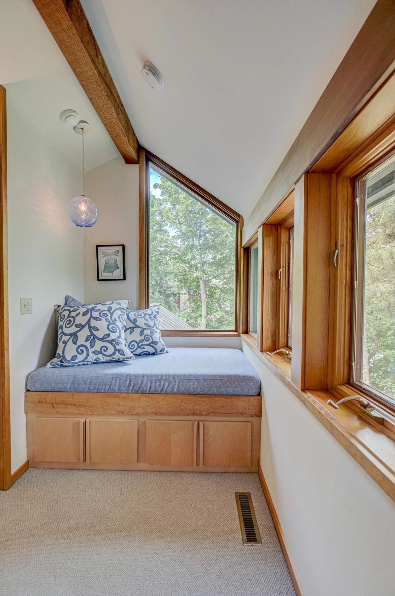 At the top of the stairs to the second level, this cozy reading nook invites you to enjoy a time out from your busy day.