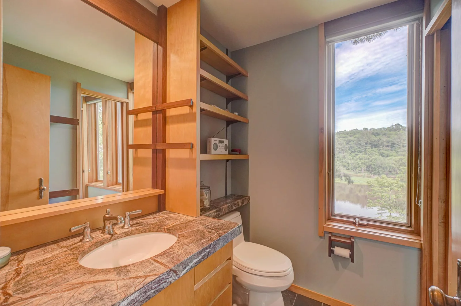There is also the option to use the door as pictured on right to create a half bath to the north and combine the shower and soaking tub into one en suite bathroom serving the primary bedroom.