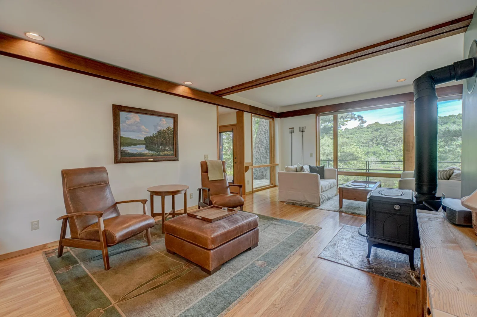 Natural wood, spare ornamentation, and large windows are a few of the hallmarks of a Mike McGuire design.