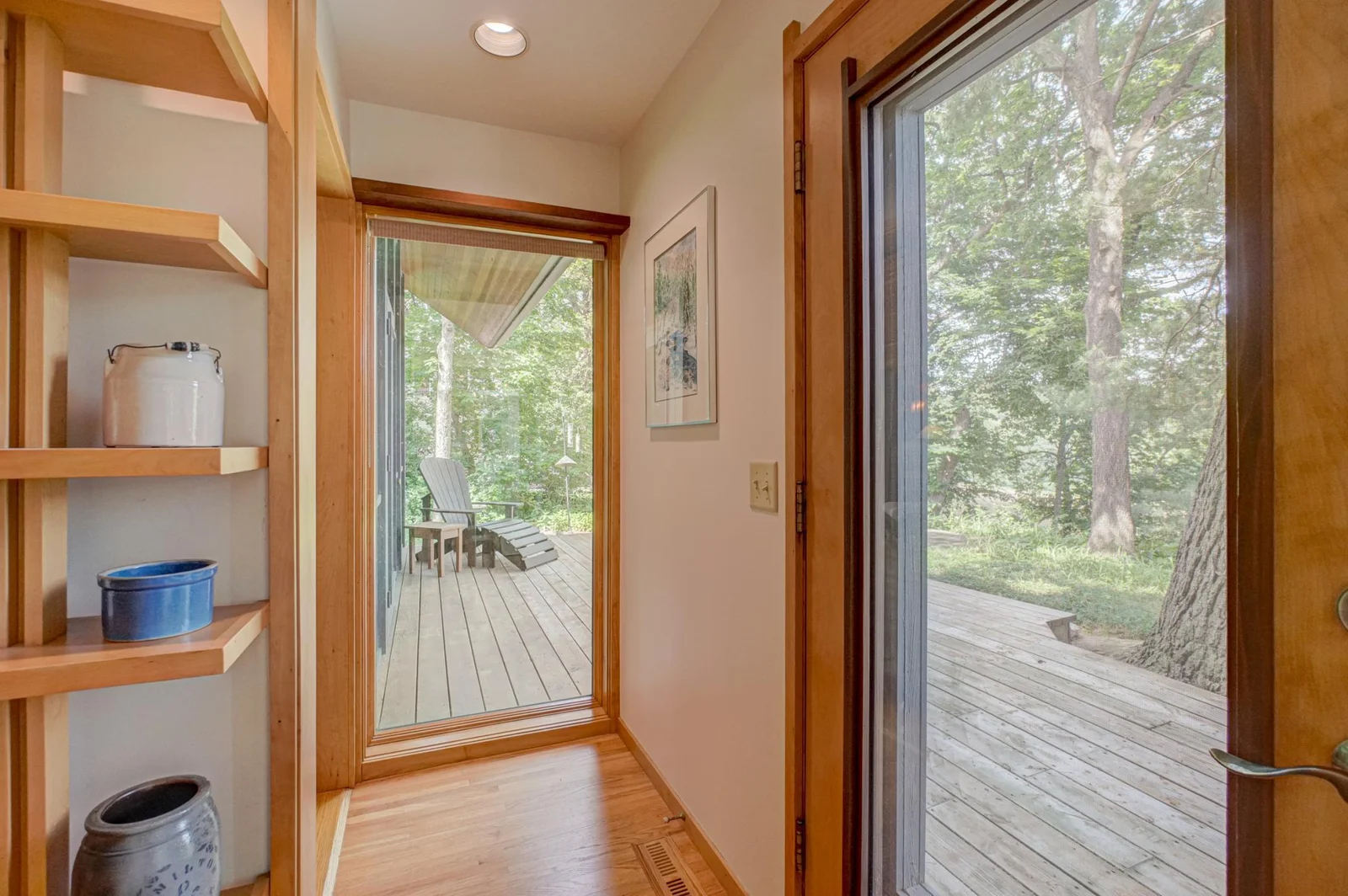 This wall of window is mirrored on the opposite side of the living space.