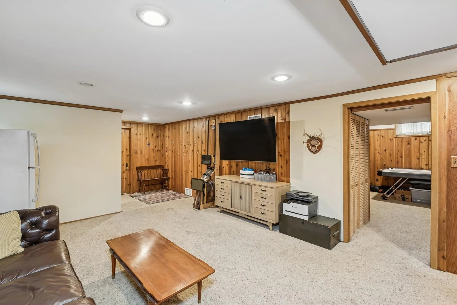 Lower Level View to Game Room, Tuck Under Garage/Workshop and 3/4 Bathroom