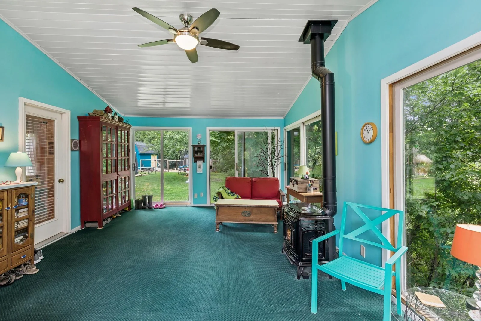Fantastic Sun Room with Gas Fireplace to the Back Yard