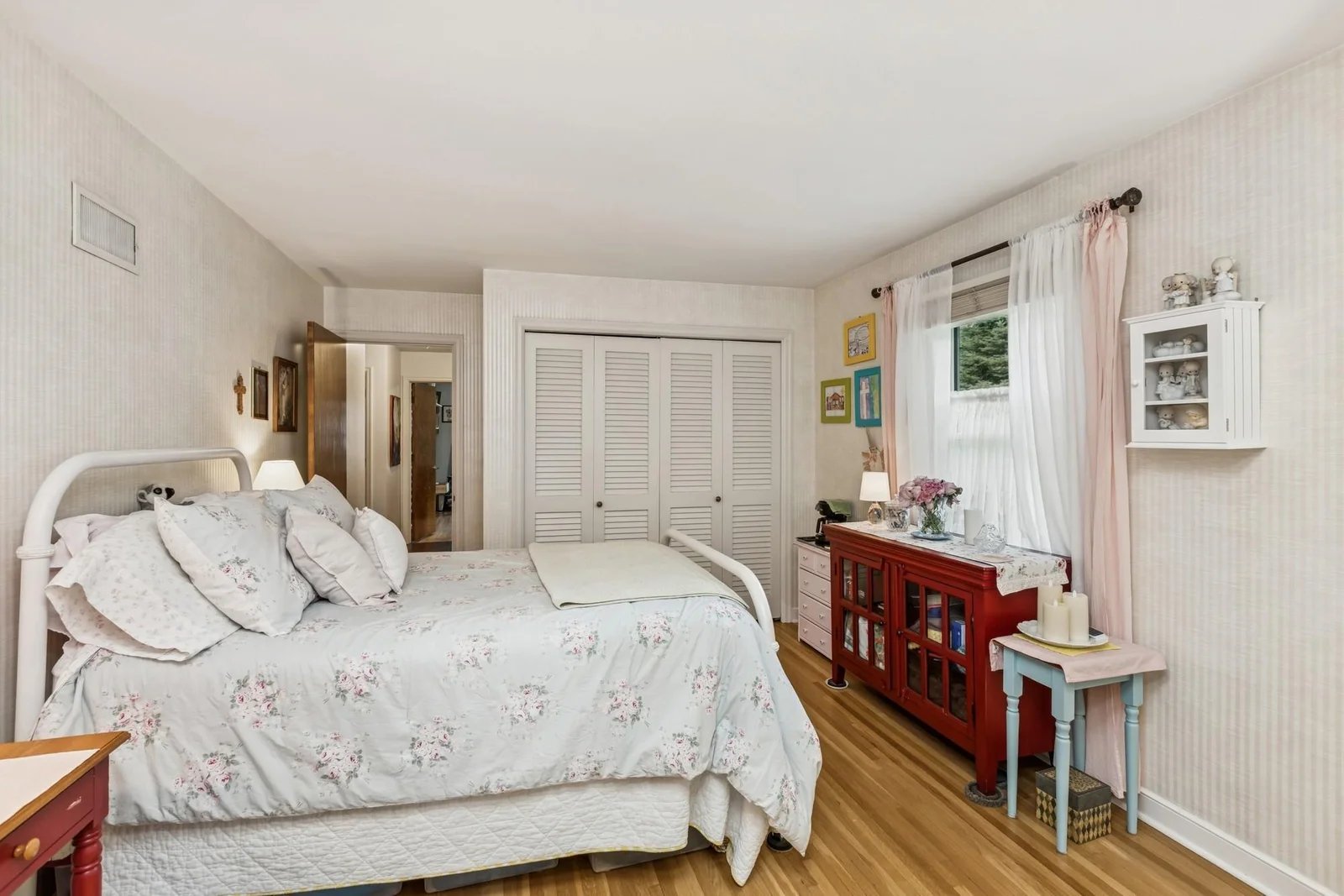 Main floor Primary Bedroom with Door to Sun Porch