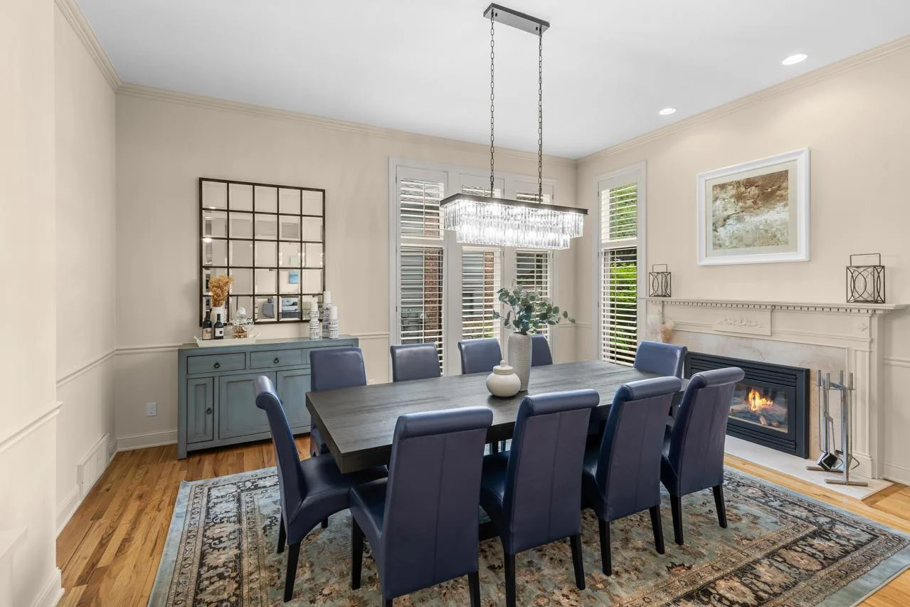 The formal dining room is centered around a beautiful fireplace that adds warmth and ambiance to every gathering.