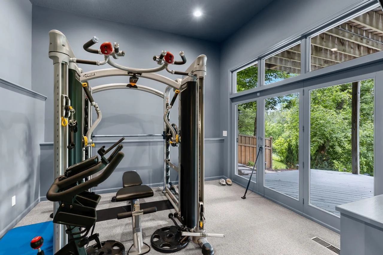 A fitness area with access to the outdoors.