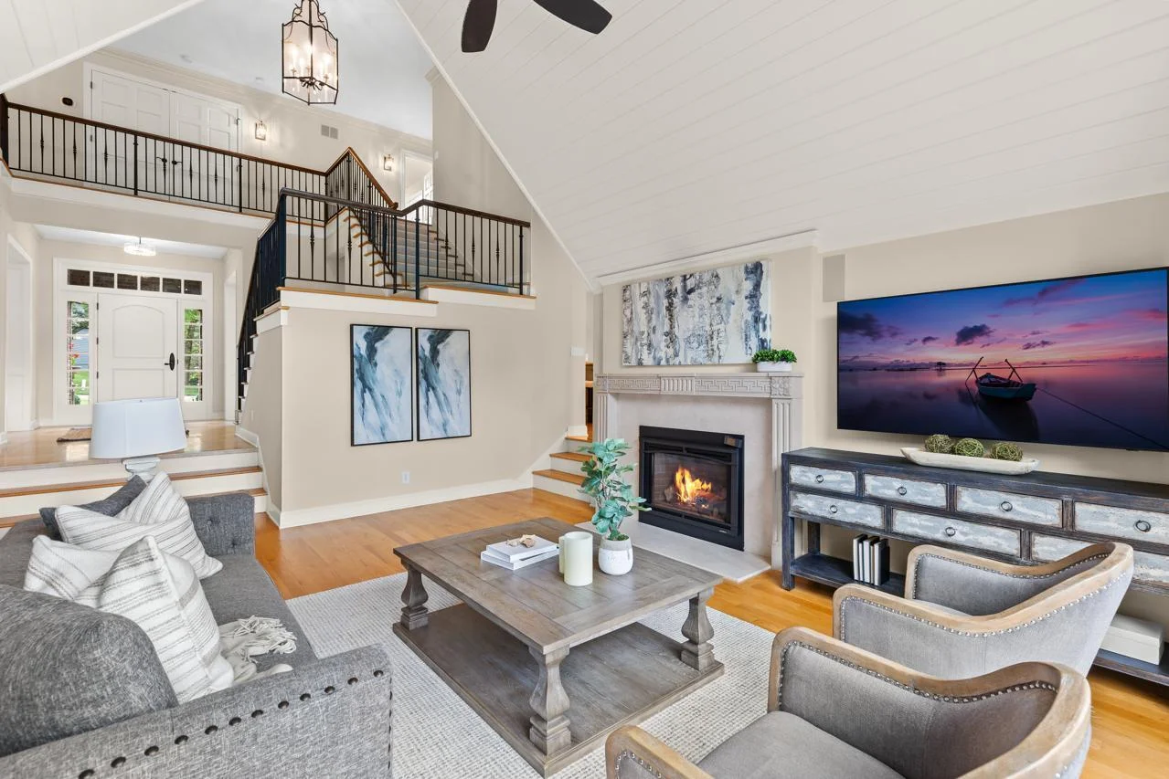 The living room features a stunning fireplace that serves as a cozy focal point.