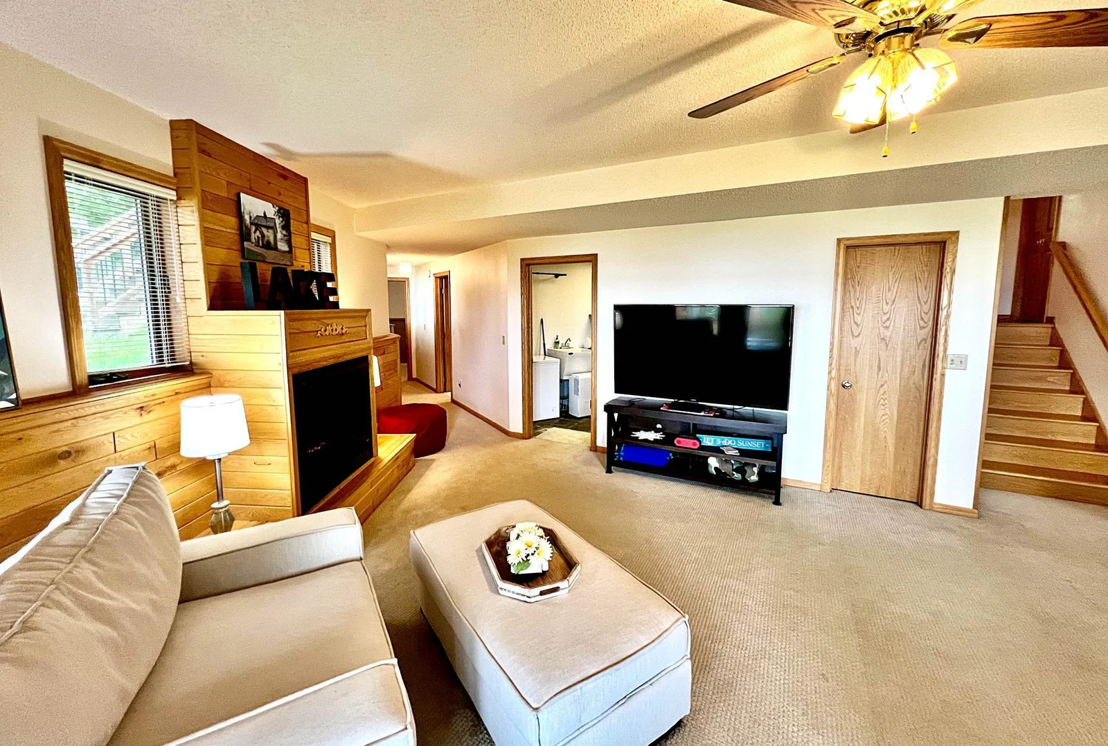 Family room with fireplace lower level walkout.jpg