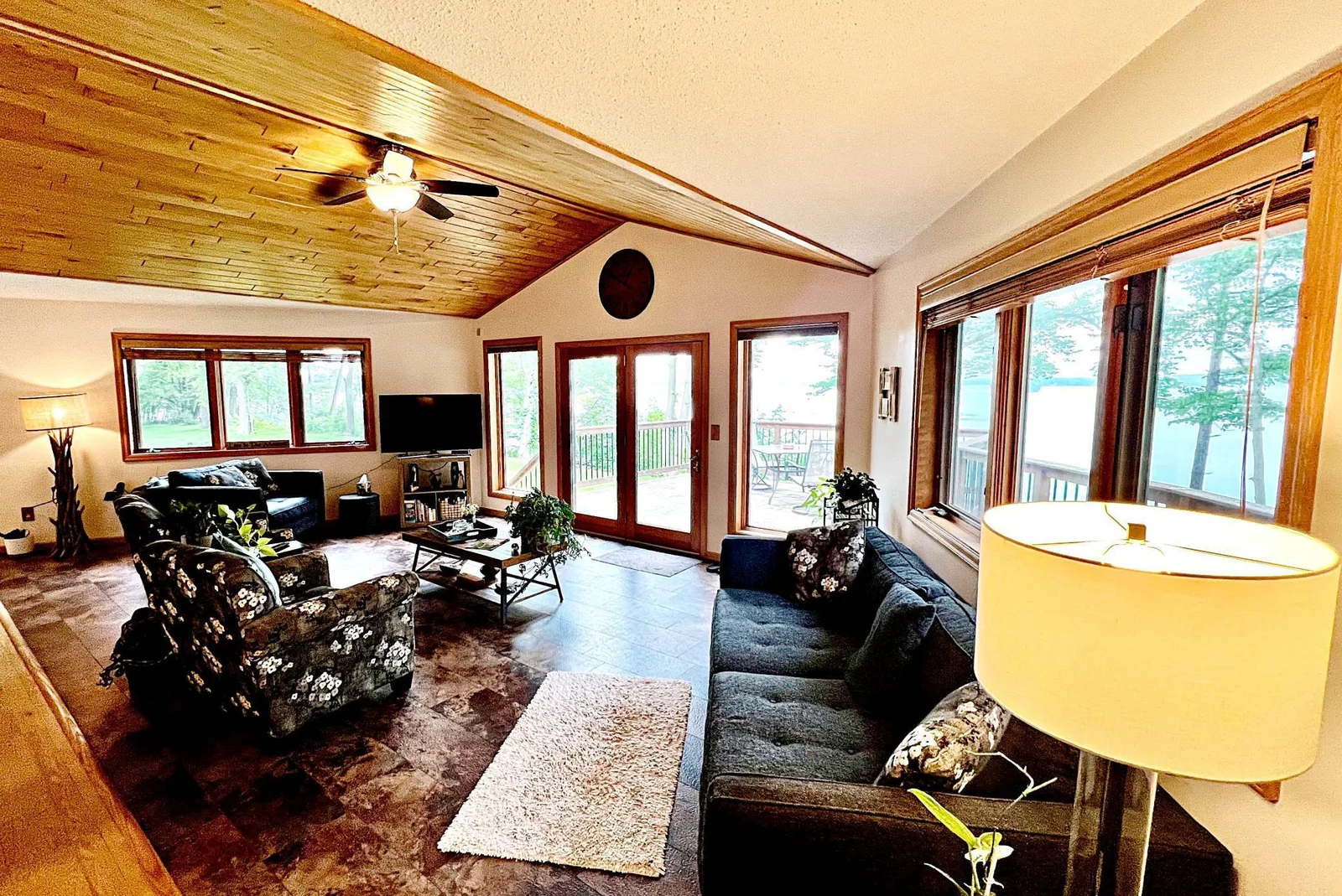 Upper Living room with fireplace and lake views 2.jpg
