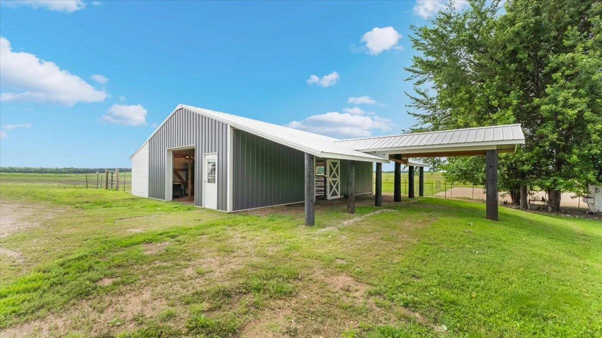24'x40' barn built in 2016; the 8'x40' lean-to was added in 2022.