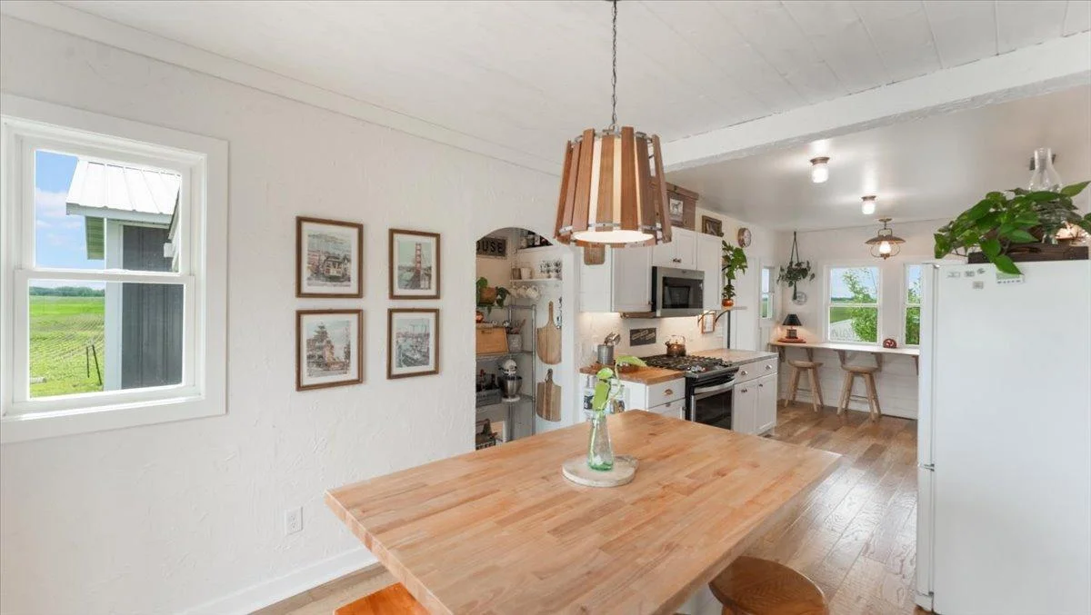 The island provides additional seating, storage, and workspace!