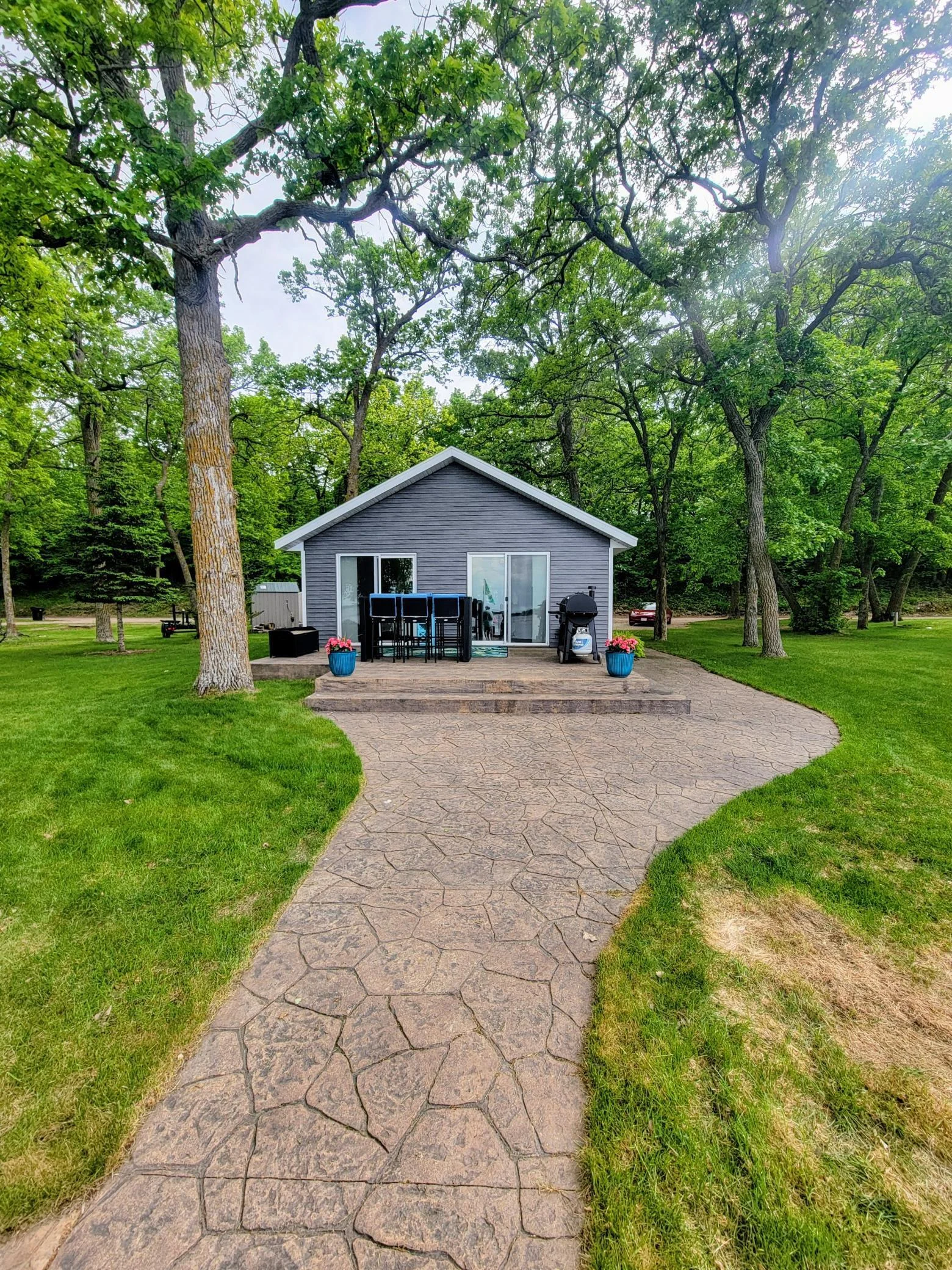 Lakeside with Large Paver Patio and Walkways