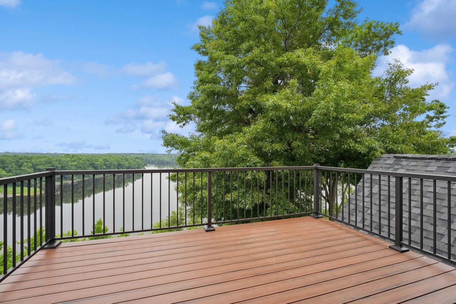 Third floor bedroom's private deck with stunning views of the river and surrounding area
