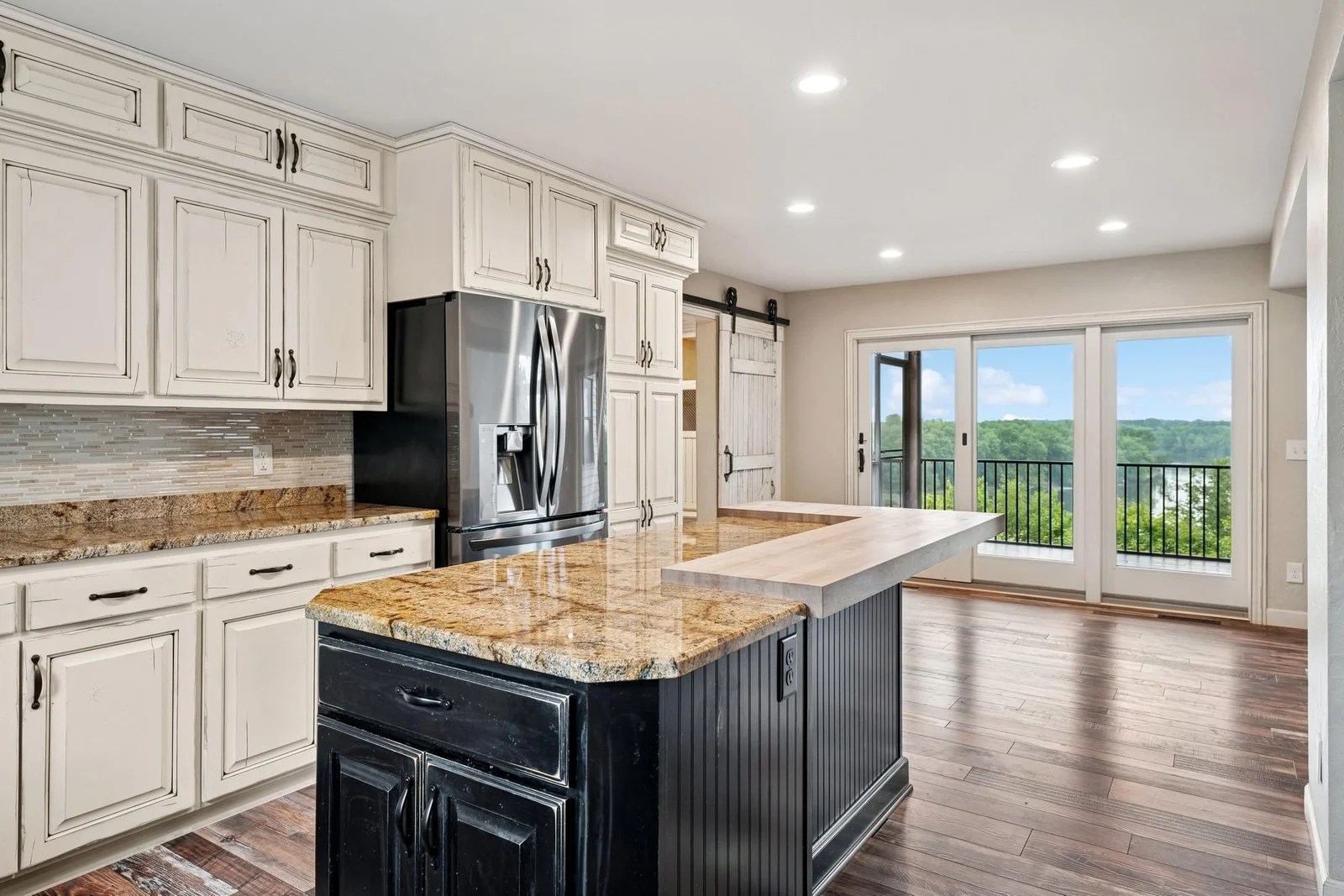 Kitchen offers views of the river and ample counter space23_1652216thStSE_2029_DownloadforMLS_2000x1333.jpg