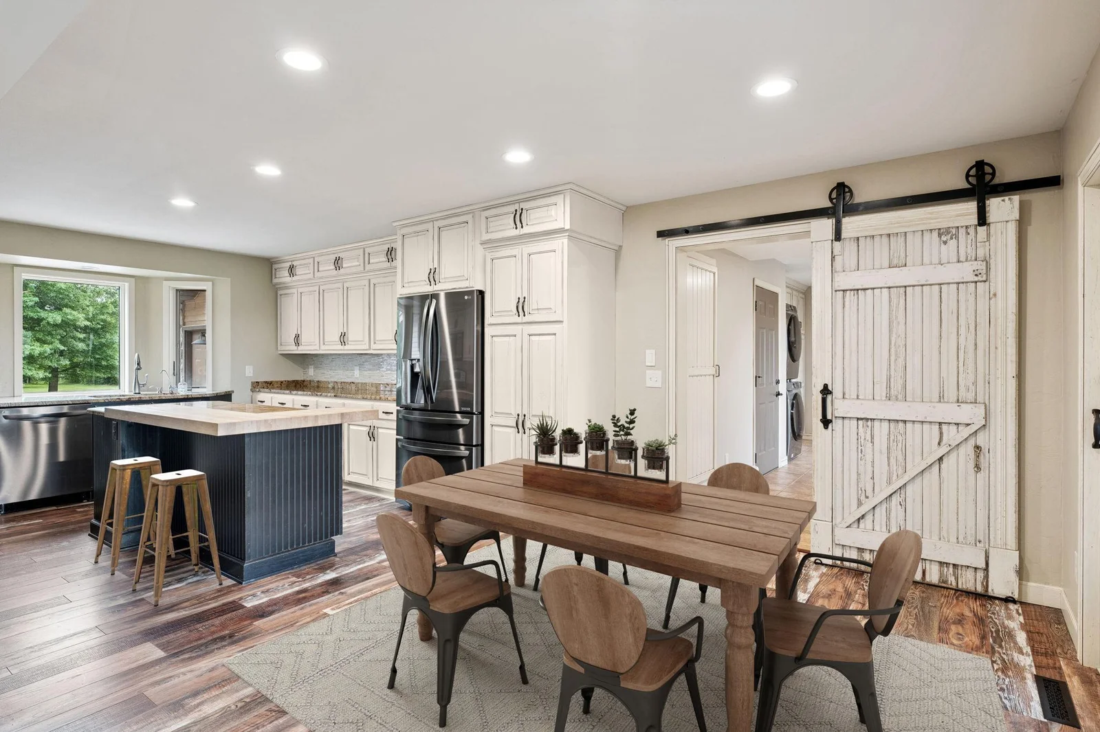 Kitchen is located in a ideal location, near the mudroom, laundry and living room (virtually staged Dining Room)