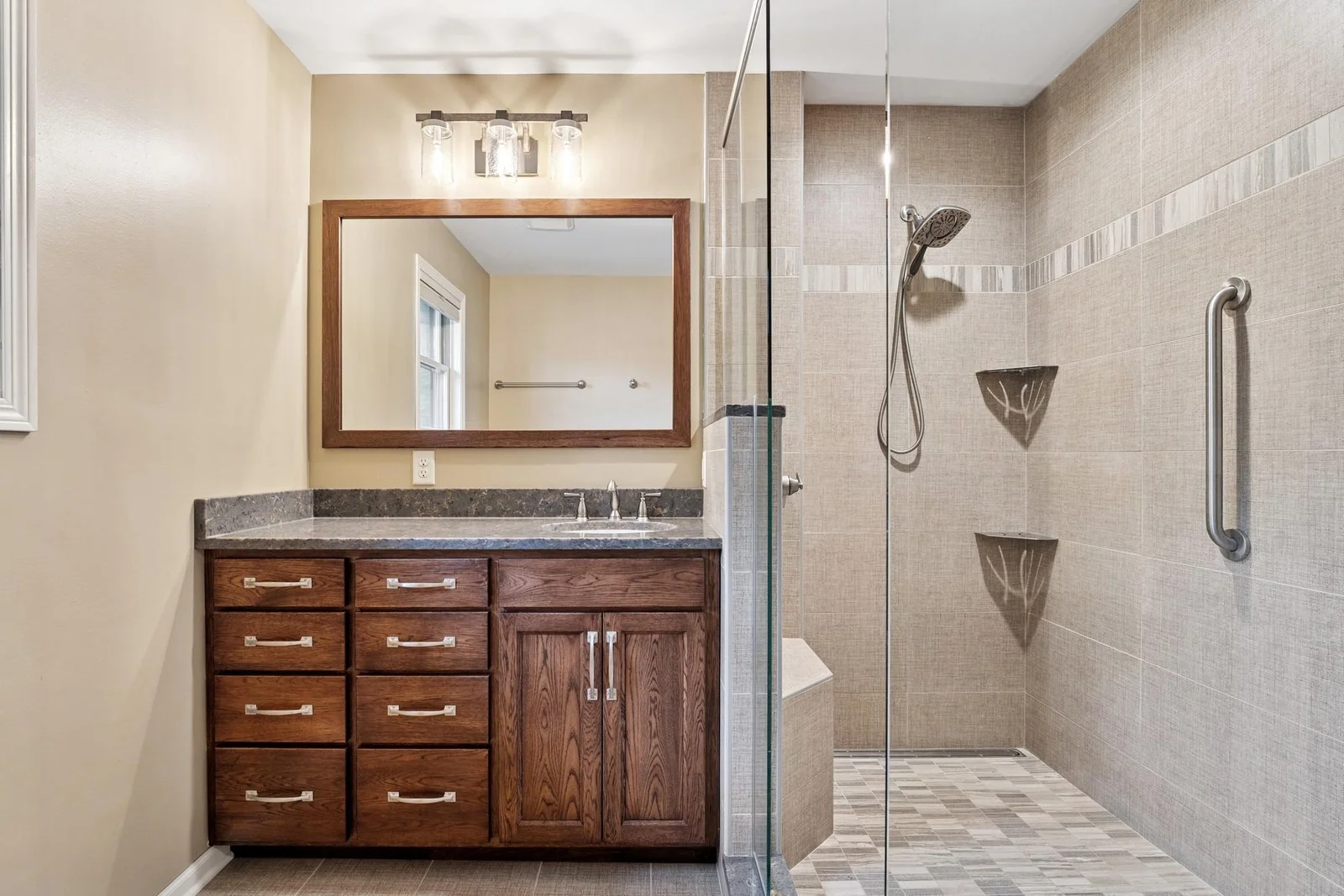 Private guest suite bath with tile shower