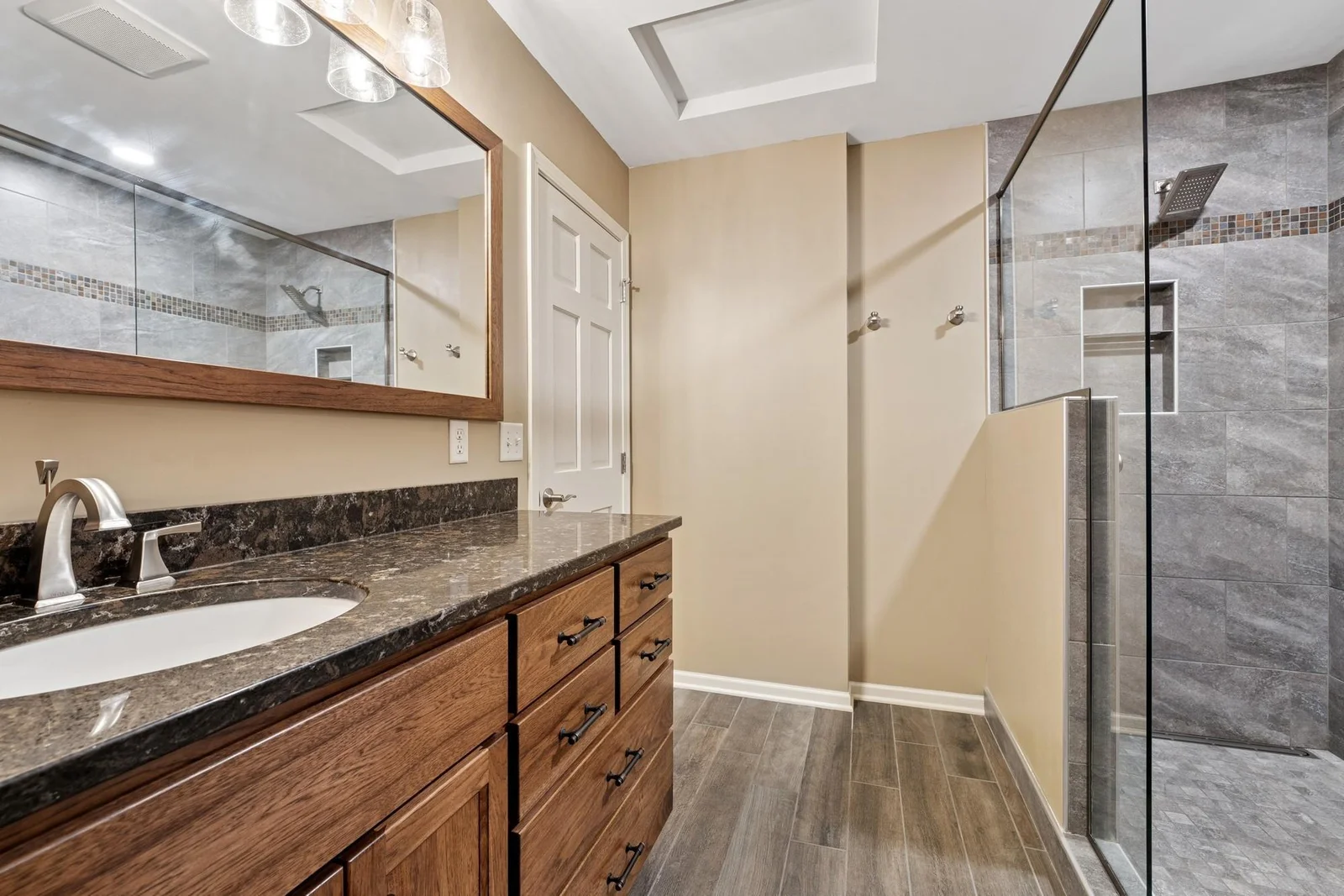 Upper level 3/4 bath recently updated with tile floors and shower