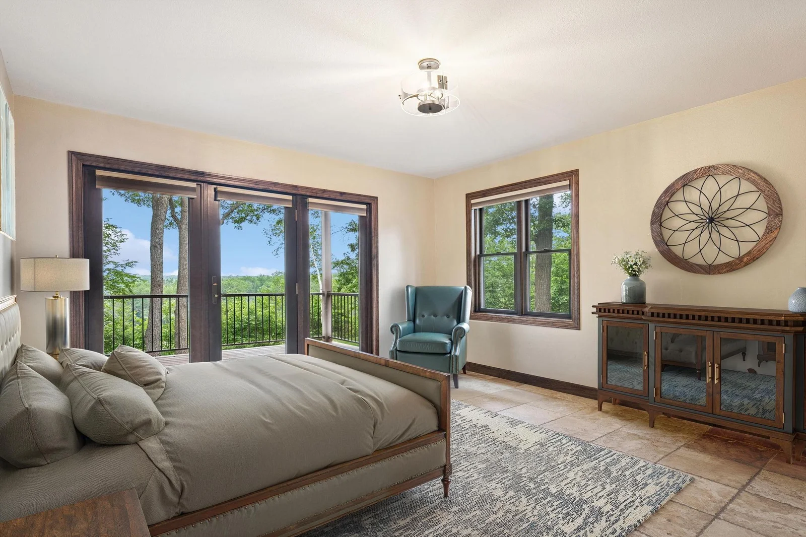 Wake up to one of the most beautiful views on the Mississippi River—nature and serenity right outside your patio door (virtually staged)