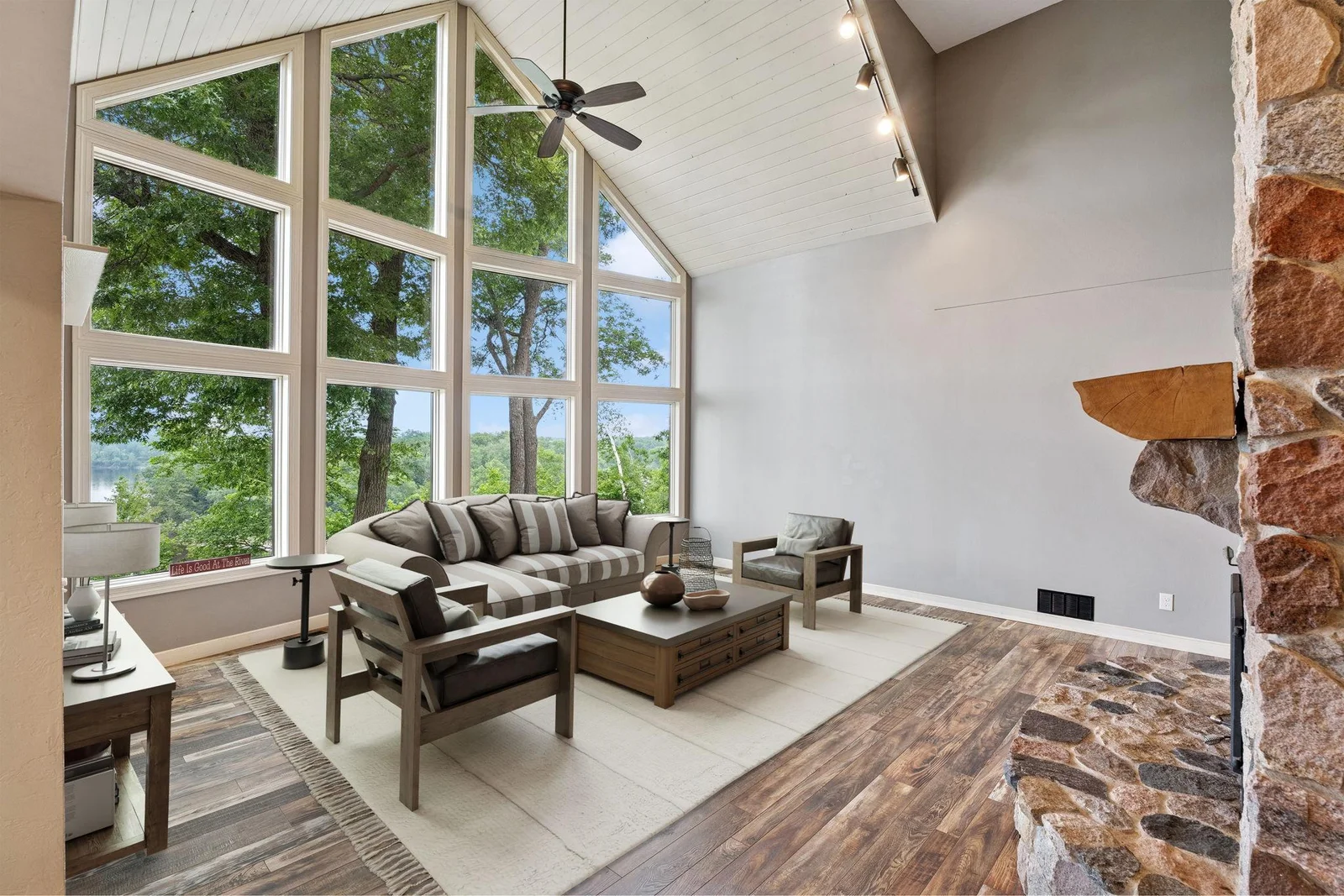 Another view of the two-story vaulted living room (virtually staged)