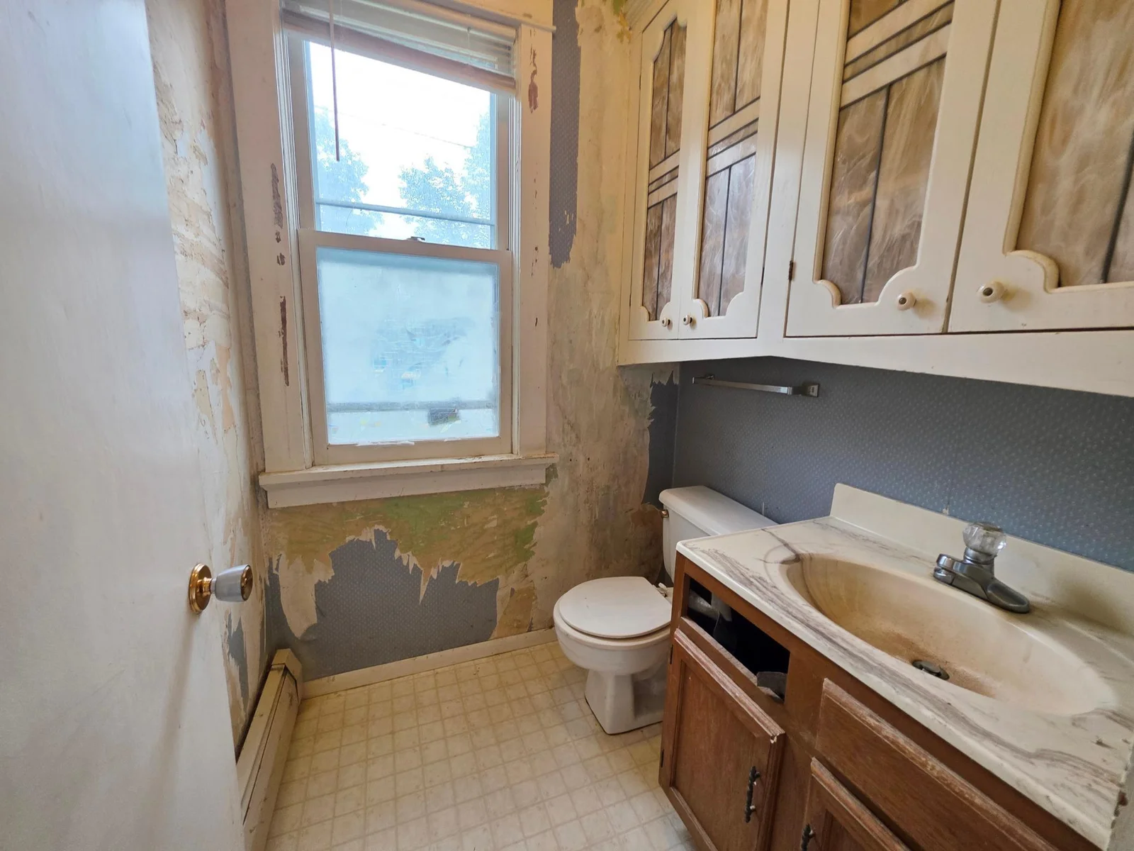 4 Bedroom 2 bathroom home on corner lot with lots of potential! 2 car detached garage. Possible investment home?