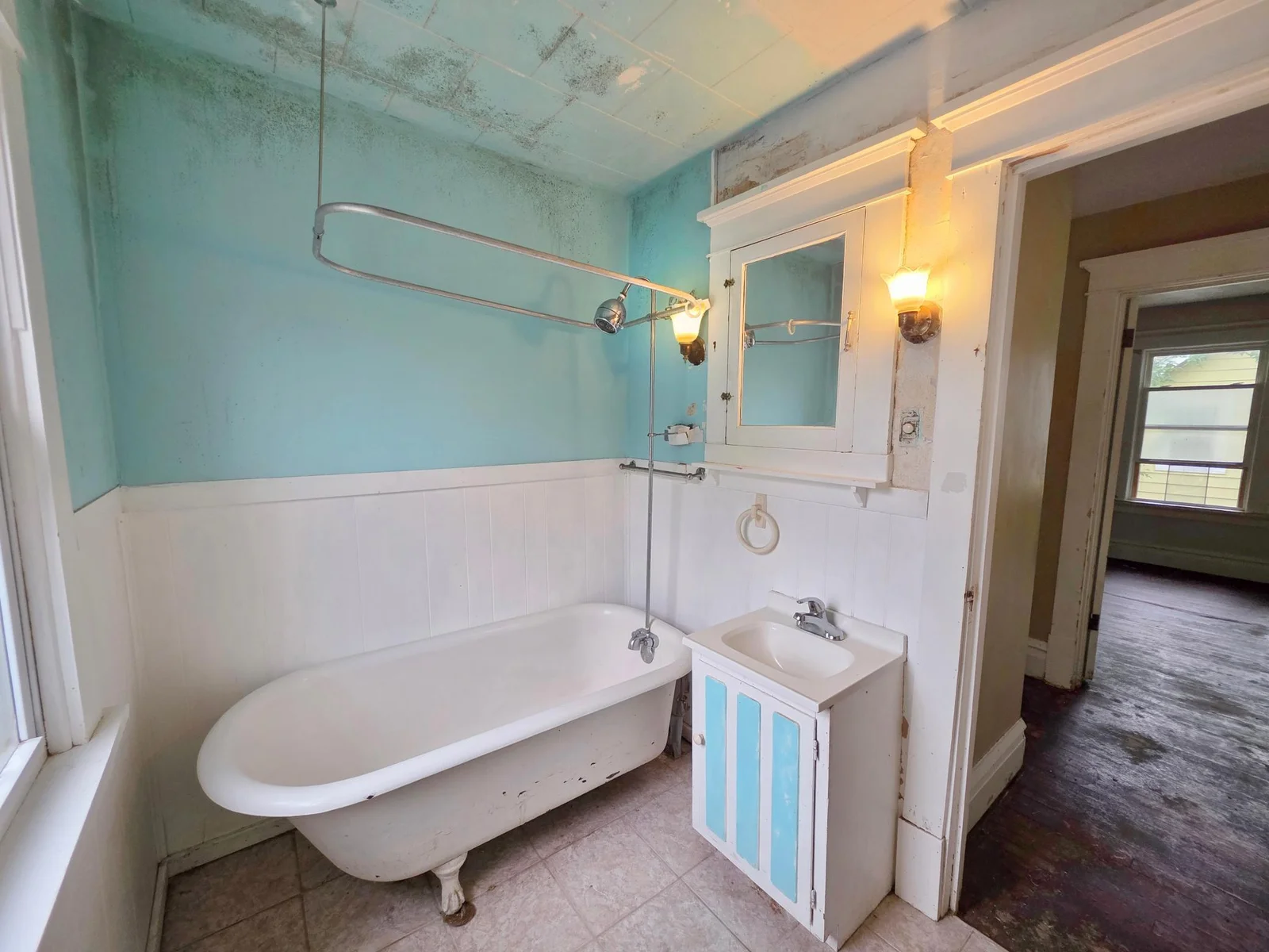 4 Bedroom 2 bathroom home on corner lot with lots of potential! 2 car detached garage. Possible investment home?