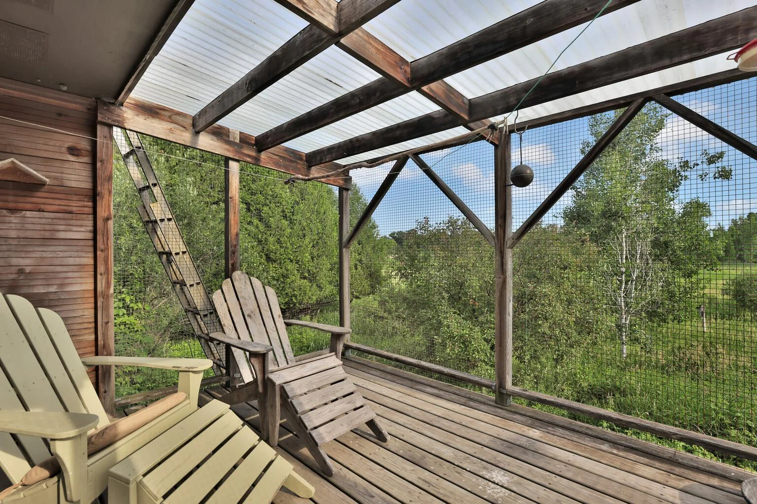 Covered deck to enjoy the wilderness surrounding you.