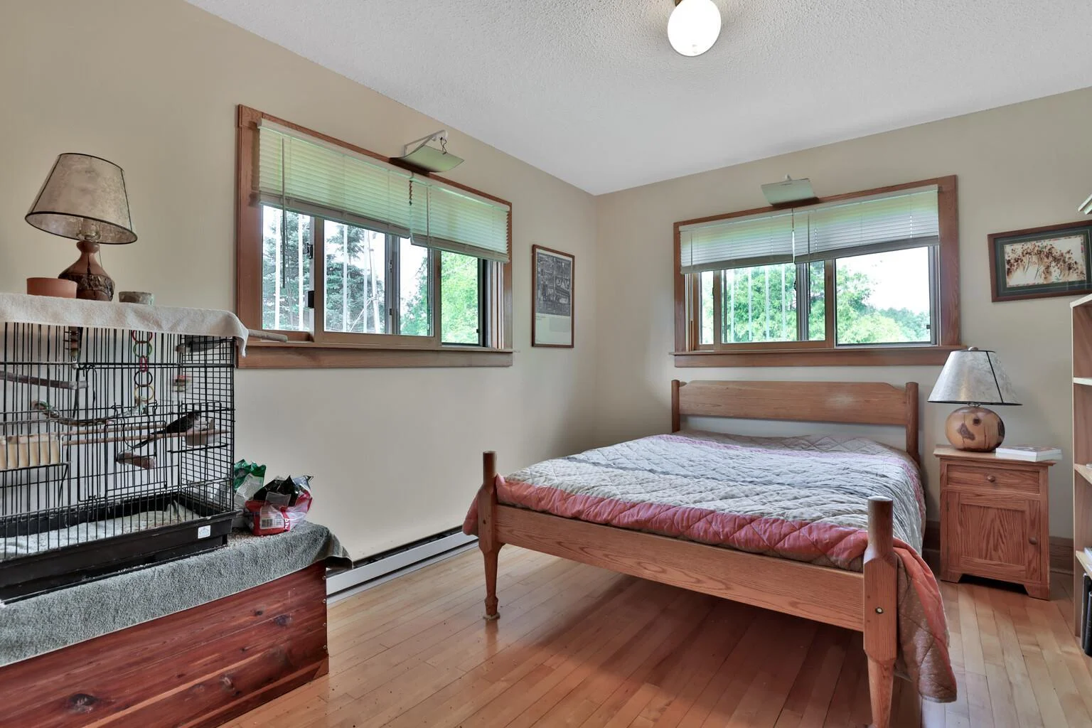 Bedroom one upper level, nice windows and maple floors