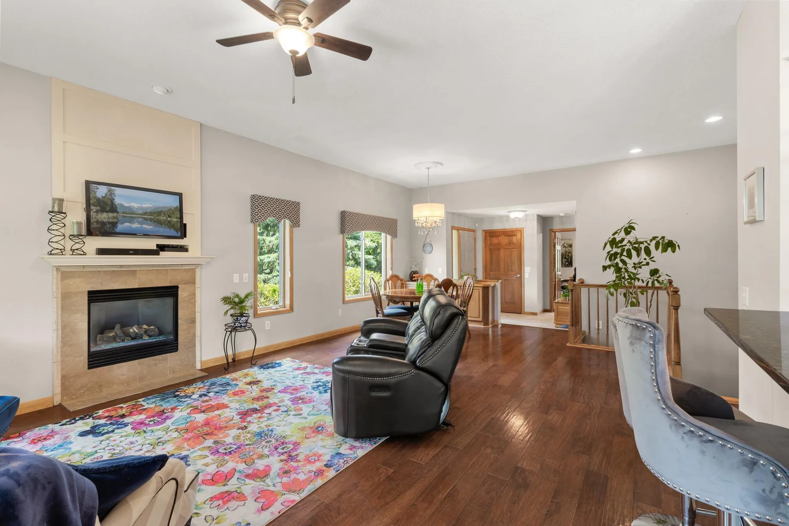 Cozy living room with gas burning fireplace.