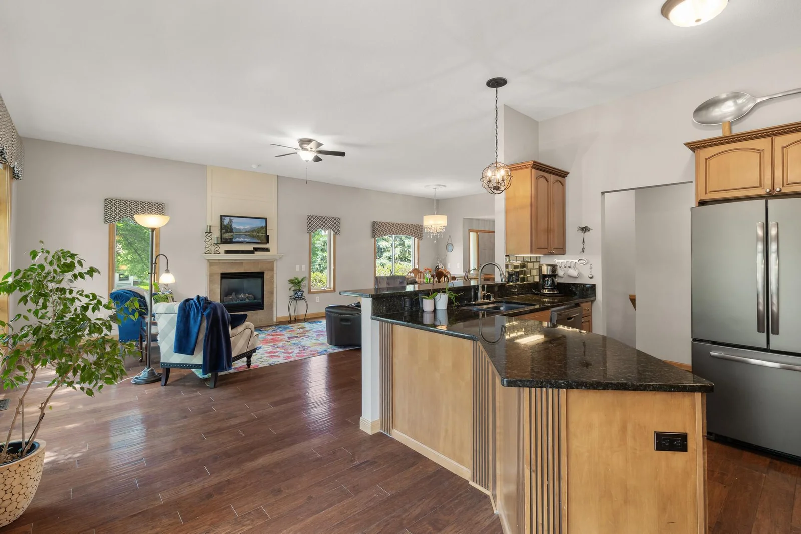 Granite countertops and stainless steel appliances.