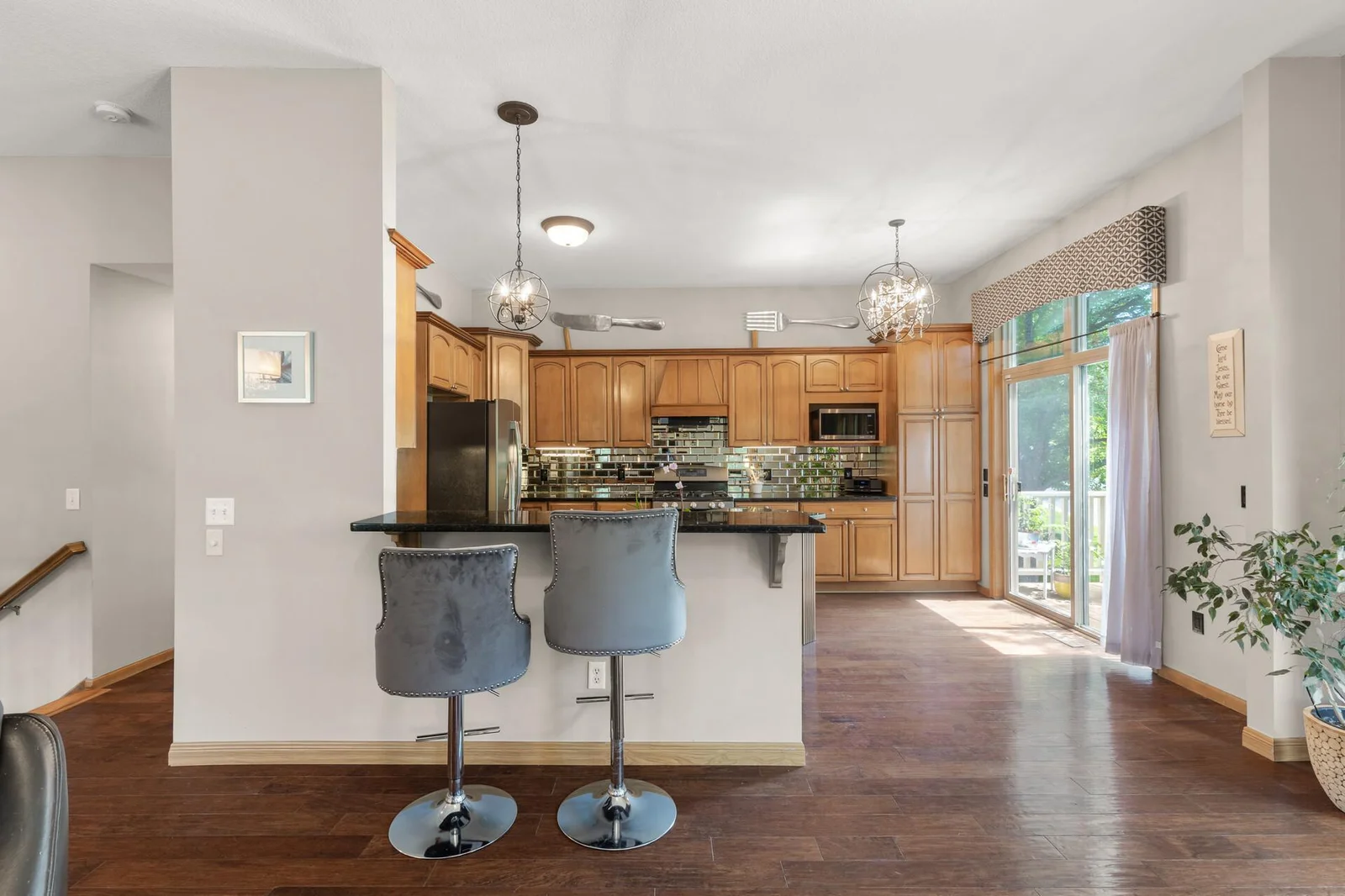 Sit at the bar and be a part of meal preparation.