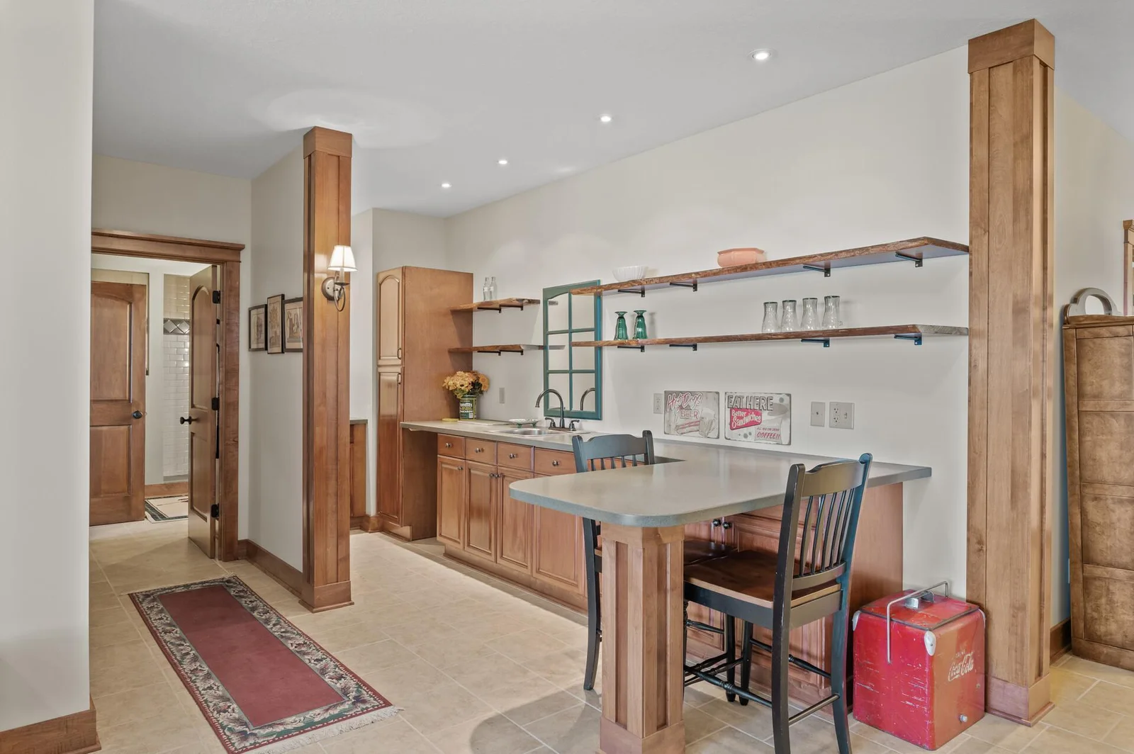 Lower level wet bar with Corian countertop & sink!