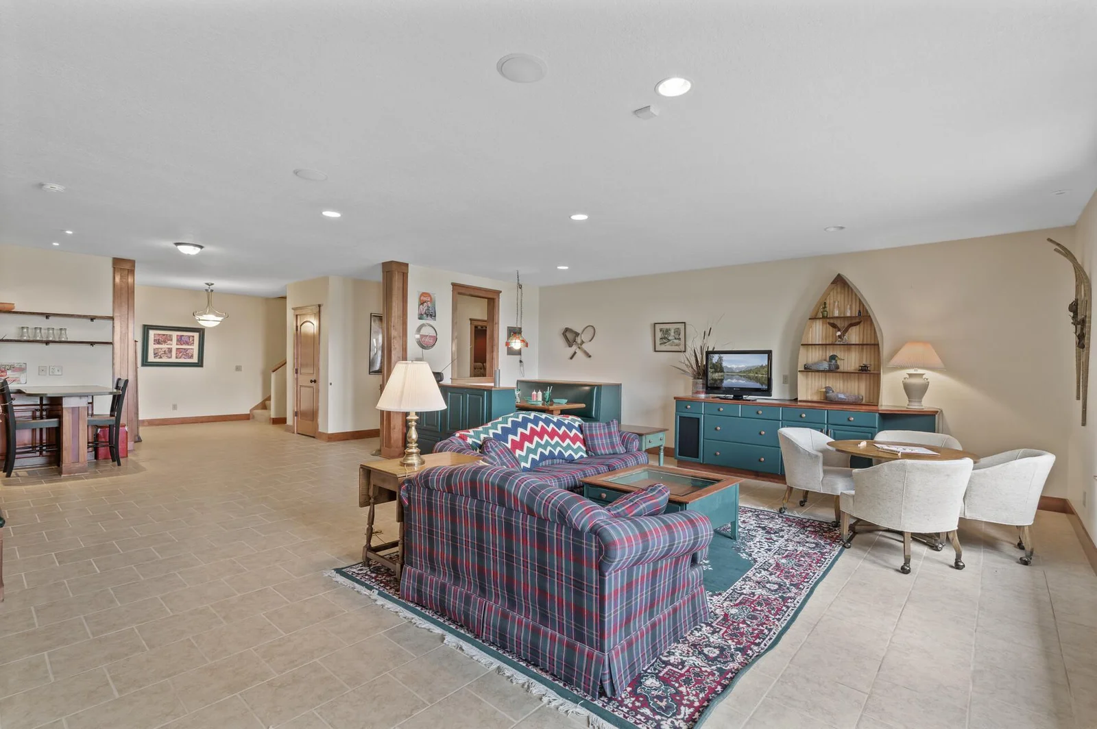 Lower level family room with built-in booth (storage inside)