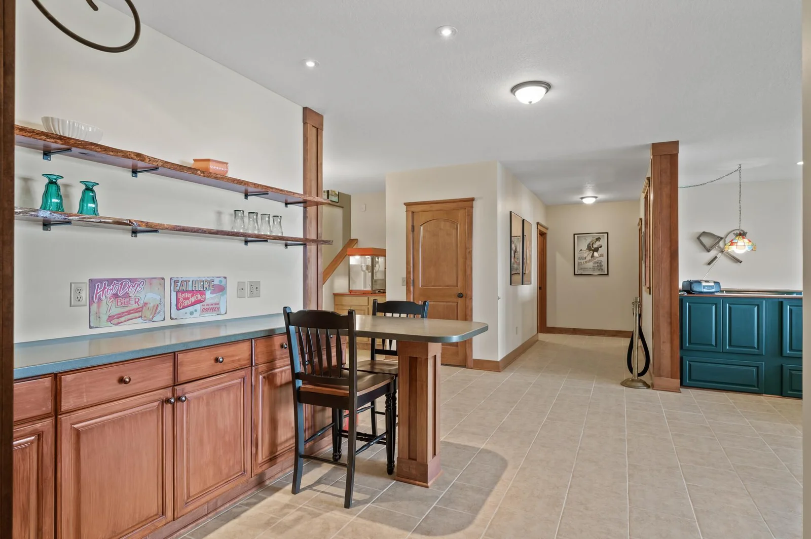 Lower level wet bar with live-edge maple shelving!
