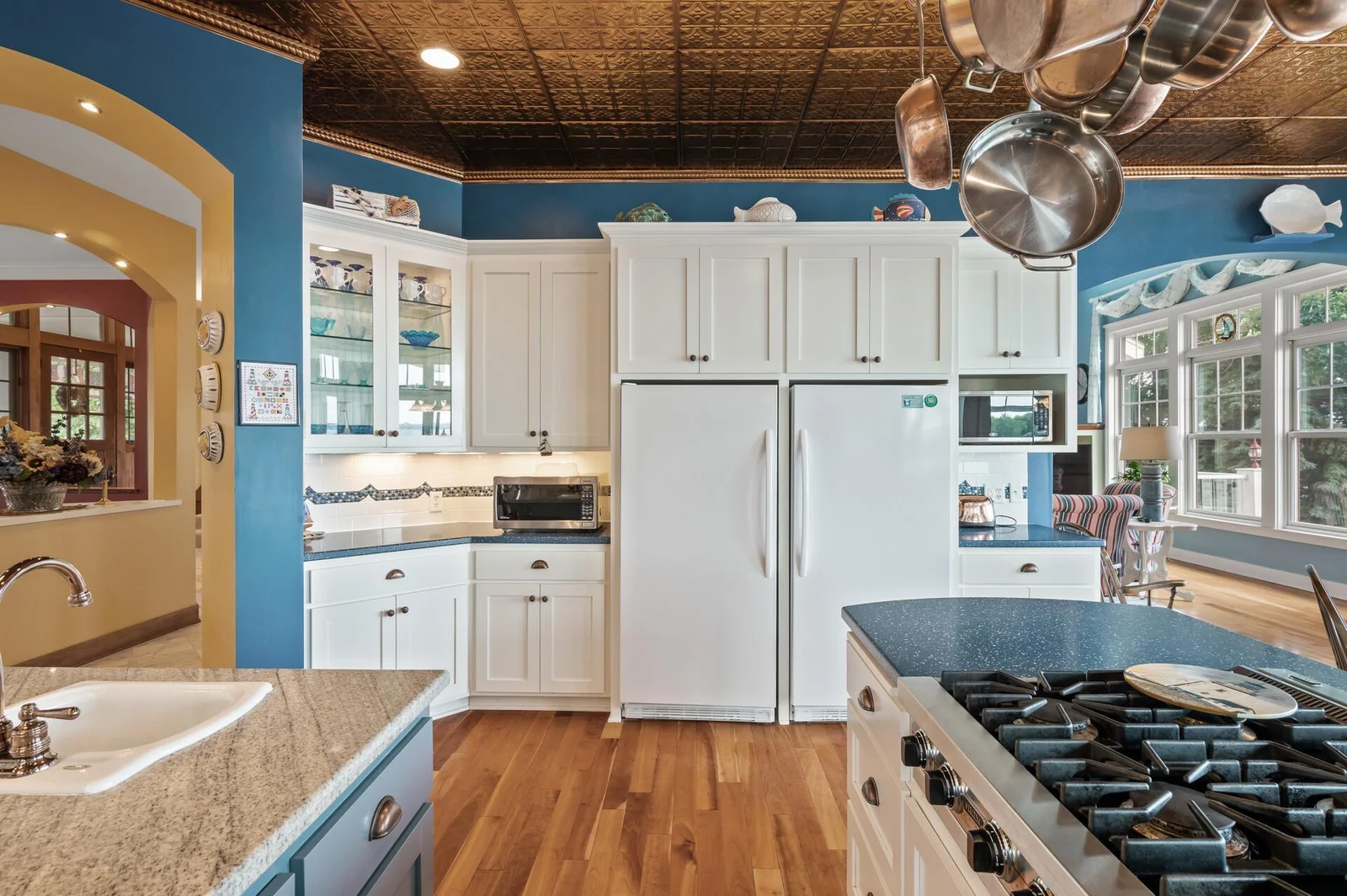 Custom cabinetry with maple flooring!