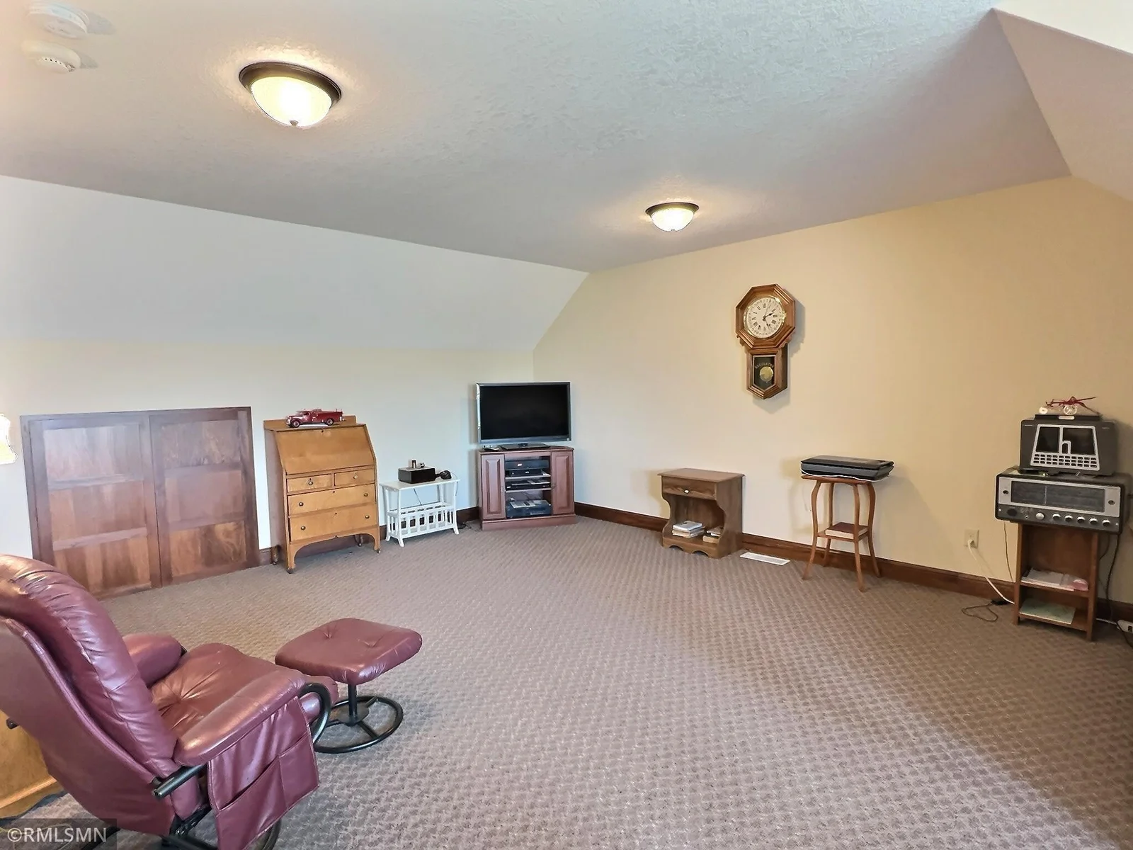Warm wood accents, half bathroom, multiple storage cubbies and thoughtful lighting complete the inviting and functional atmosphere.