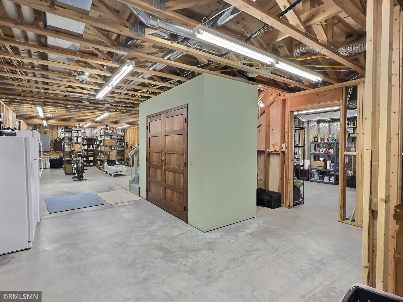 This full unfinished basement offers an abundance of space and potential to customize to your needs including a large coat closet.